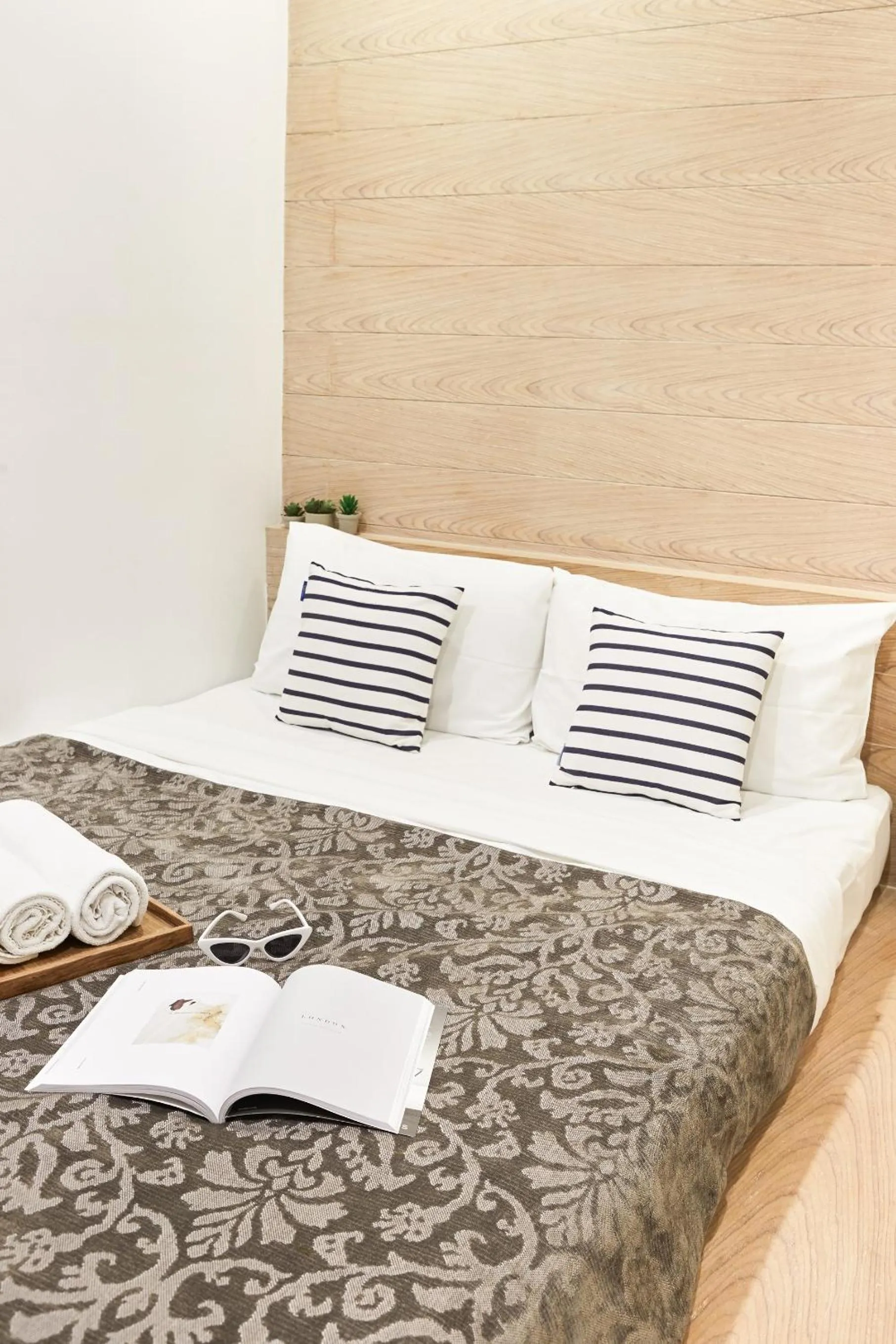 Bed in Vann Bangkok Boutique House