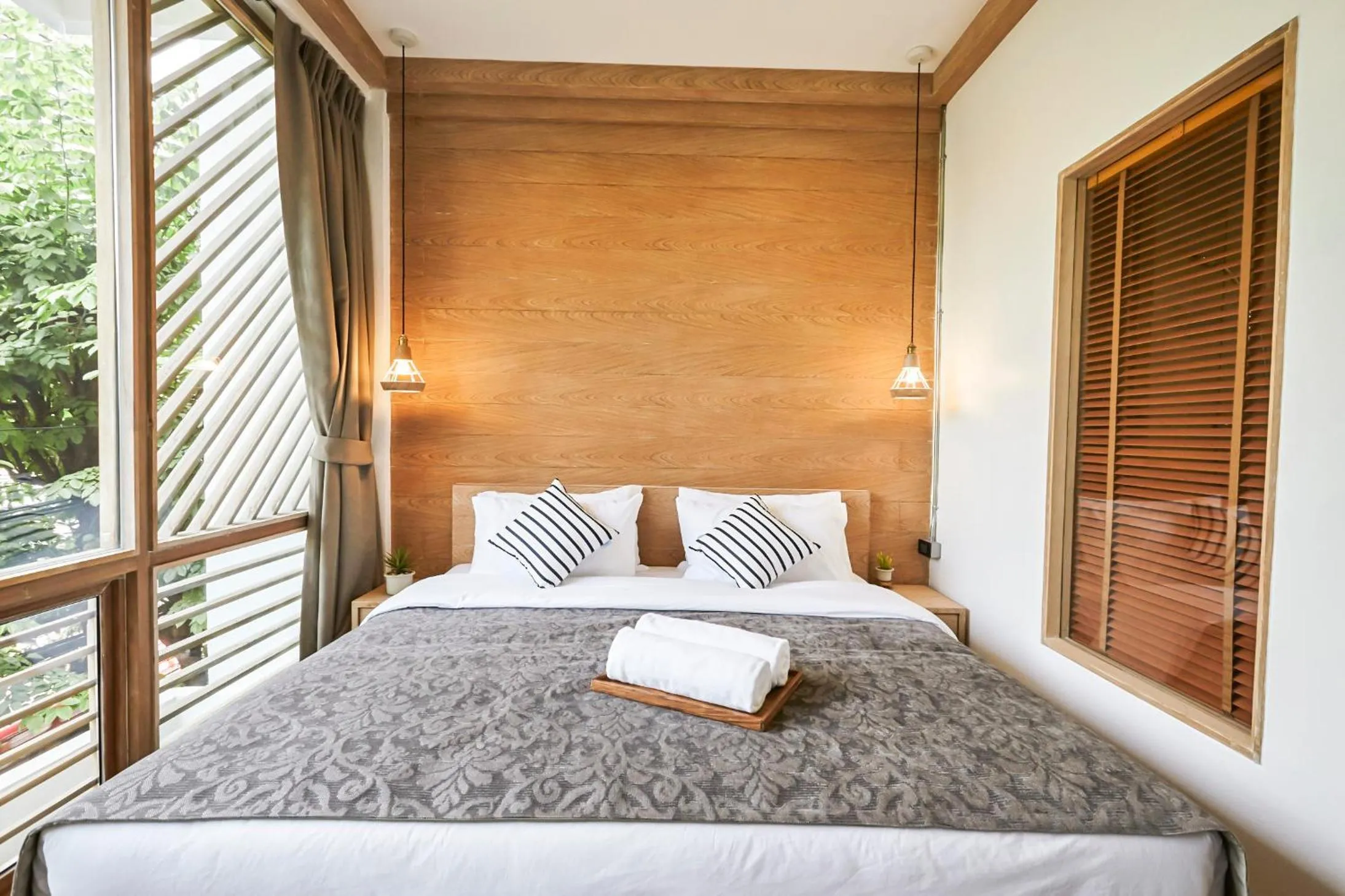 Bed in Vann Bangkok Boutique House