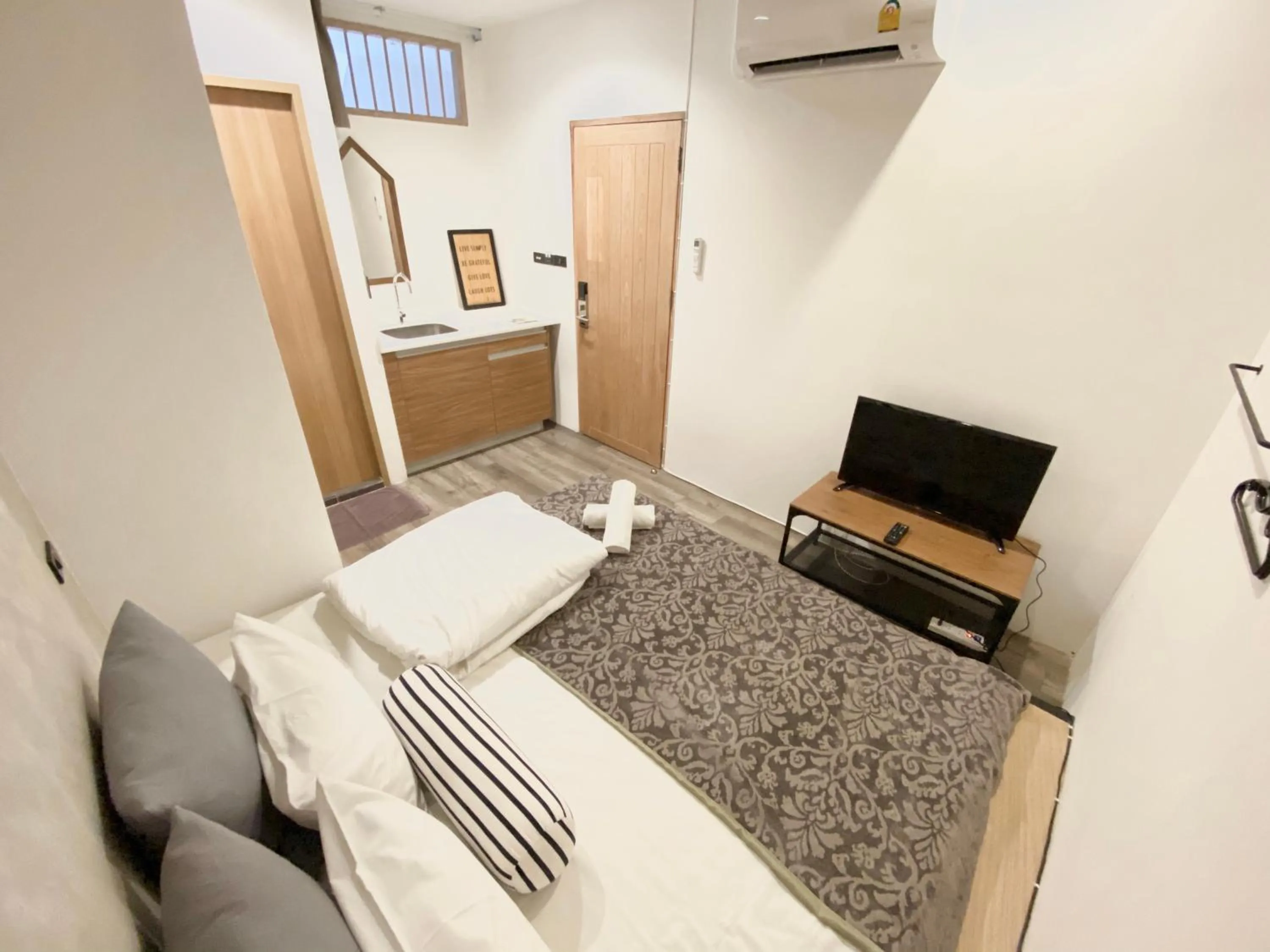 Bed in Vann Bangkok Boutique House