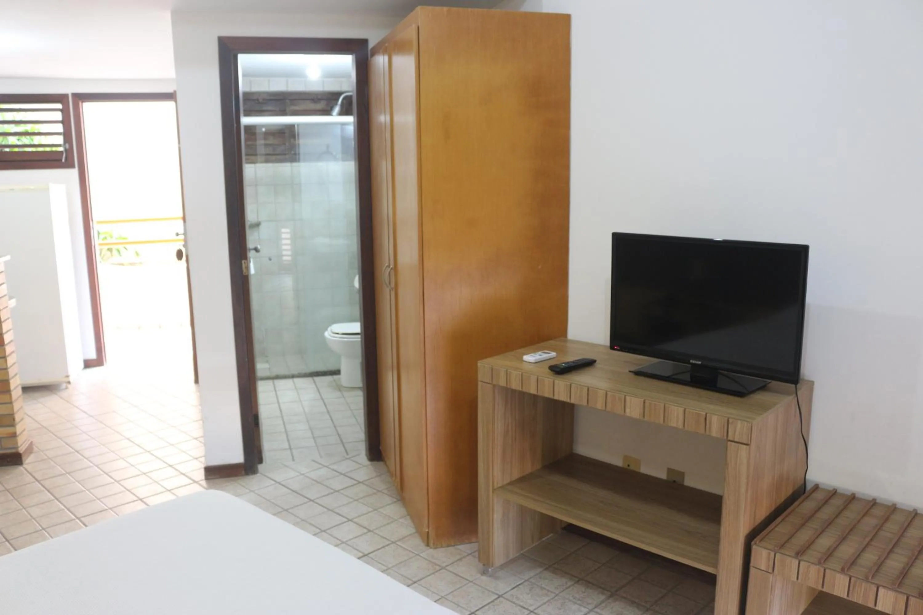 TV and multimedia in Marambaia Apart Hotel