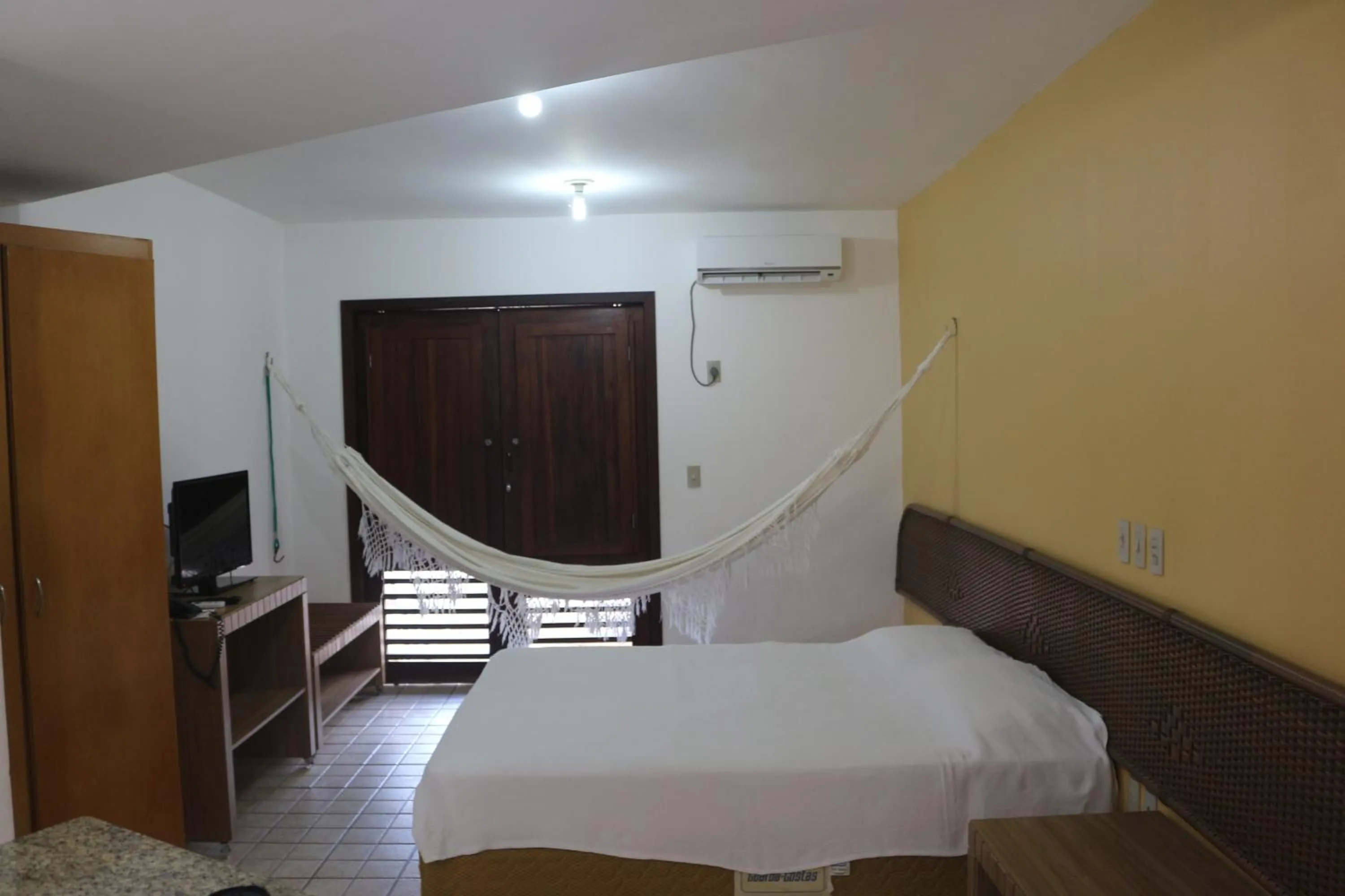 Photo of the whole room, Bed in Marambaia Apart Hotel
