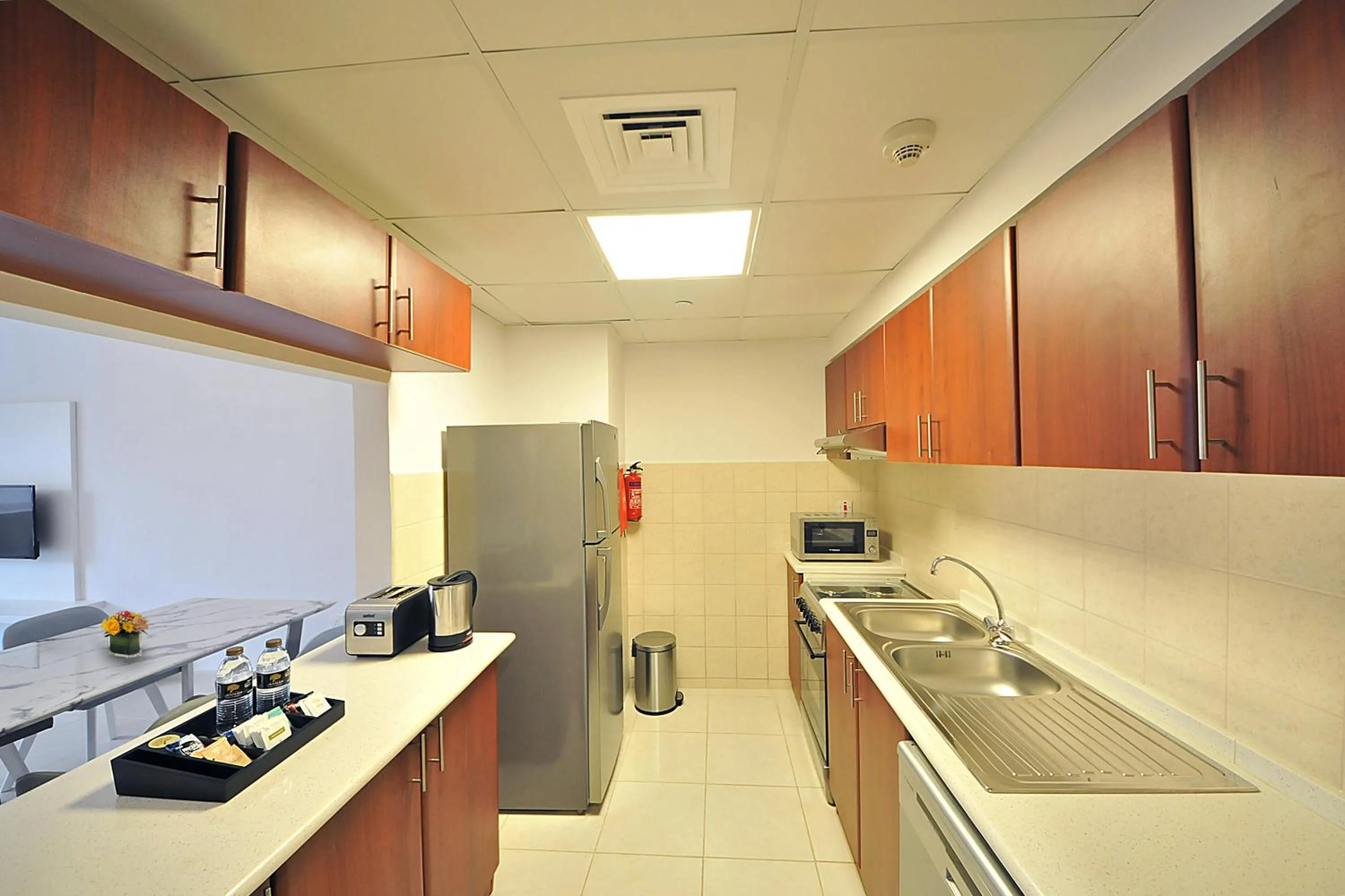 Kitchen or kitchenette in Jannah Hotel Apartments & Villas