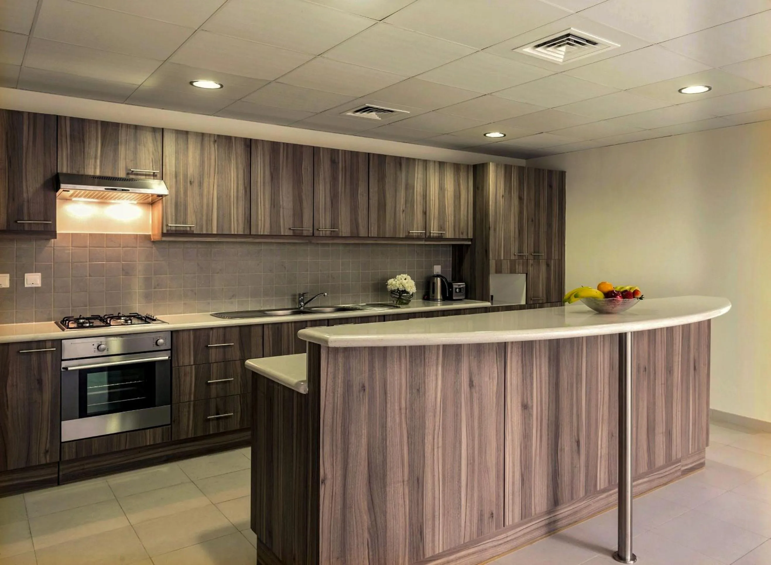 Kitchen or kitchenette in Jannah Hotel Apartments & Villas