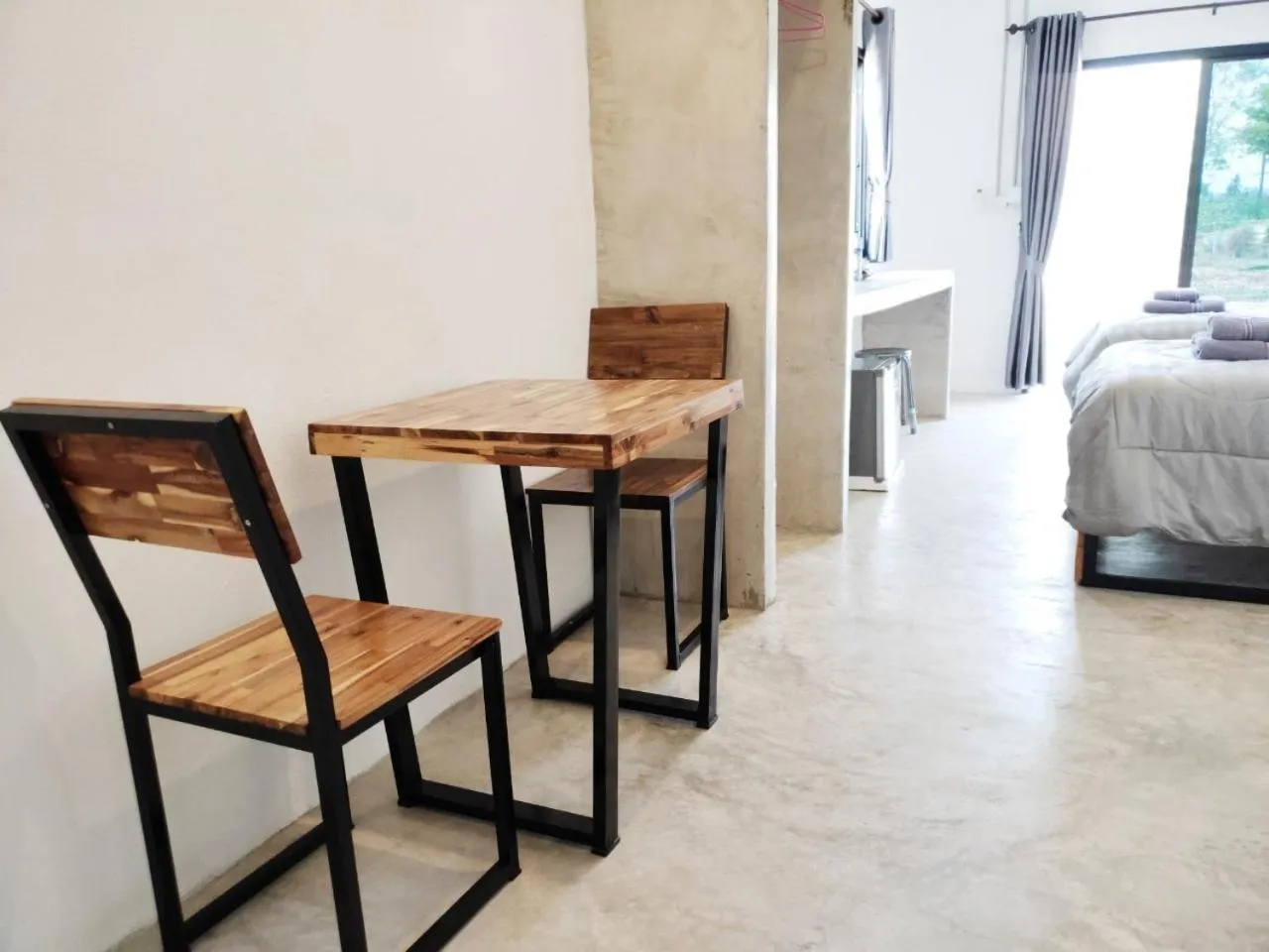 Bed in Santitham Home Farm Stay