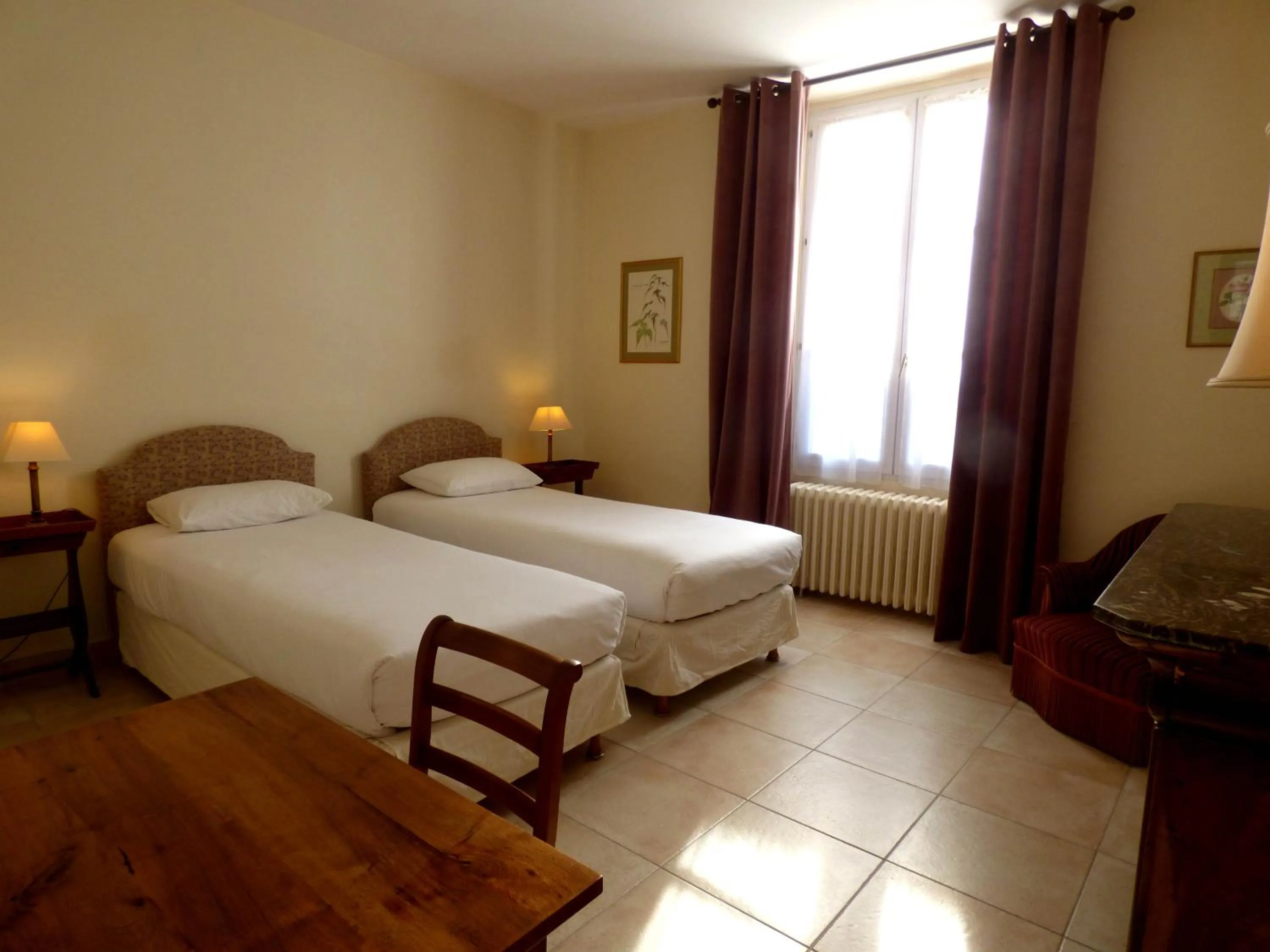 Bed in Hôtel La Tonnellerie