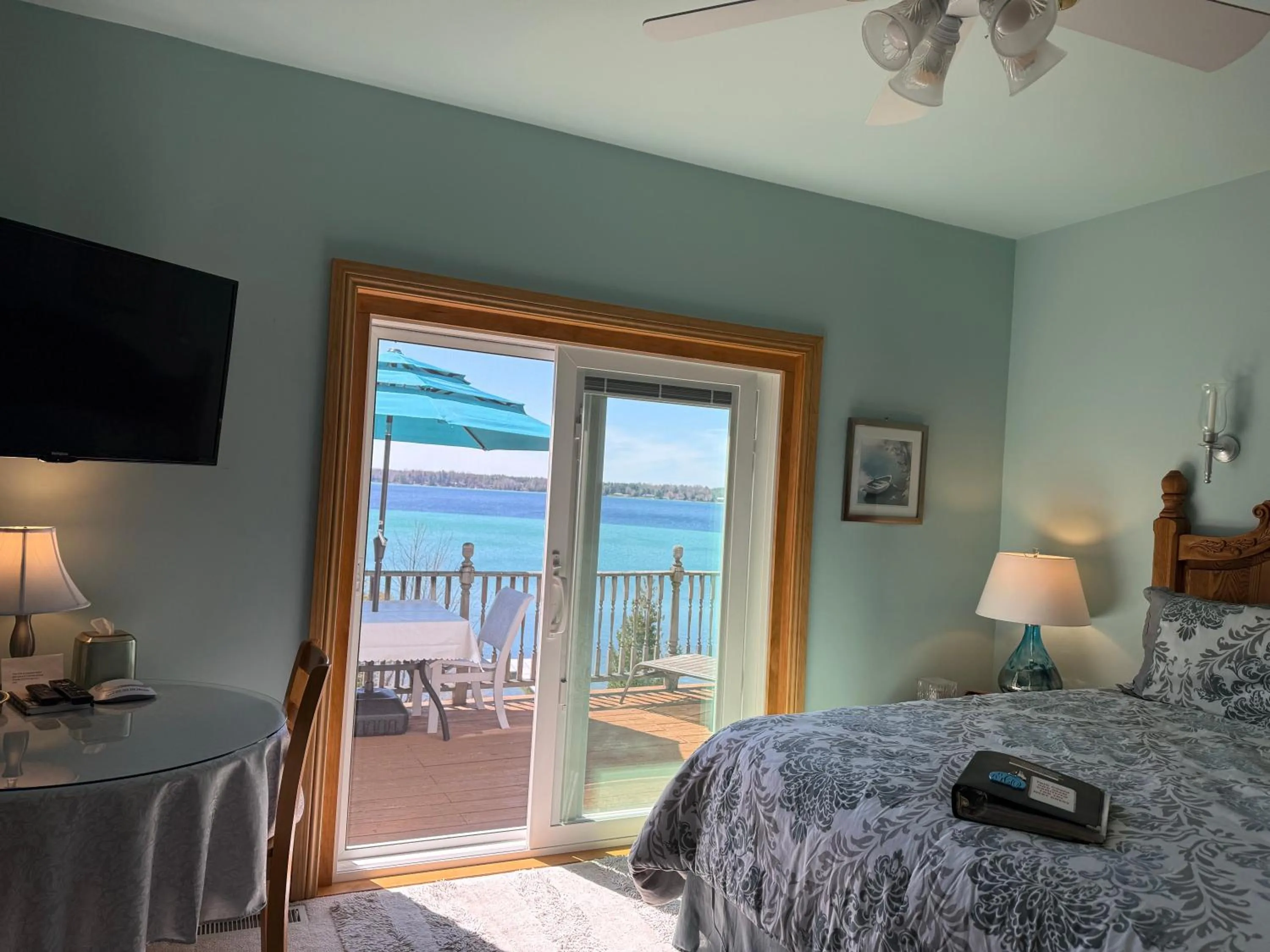 King Suite with Balcony in The Torch Lake Bed and Breakfast