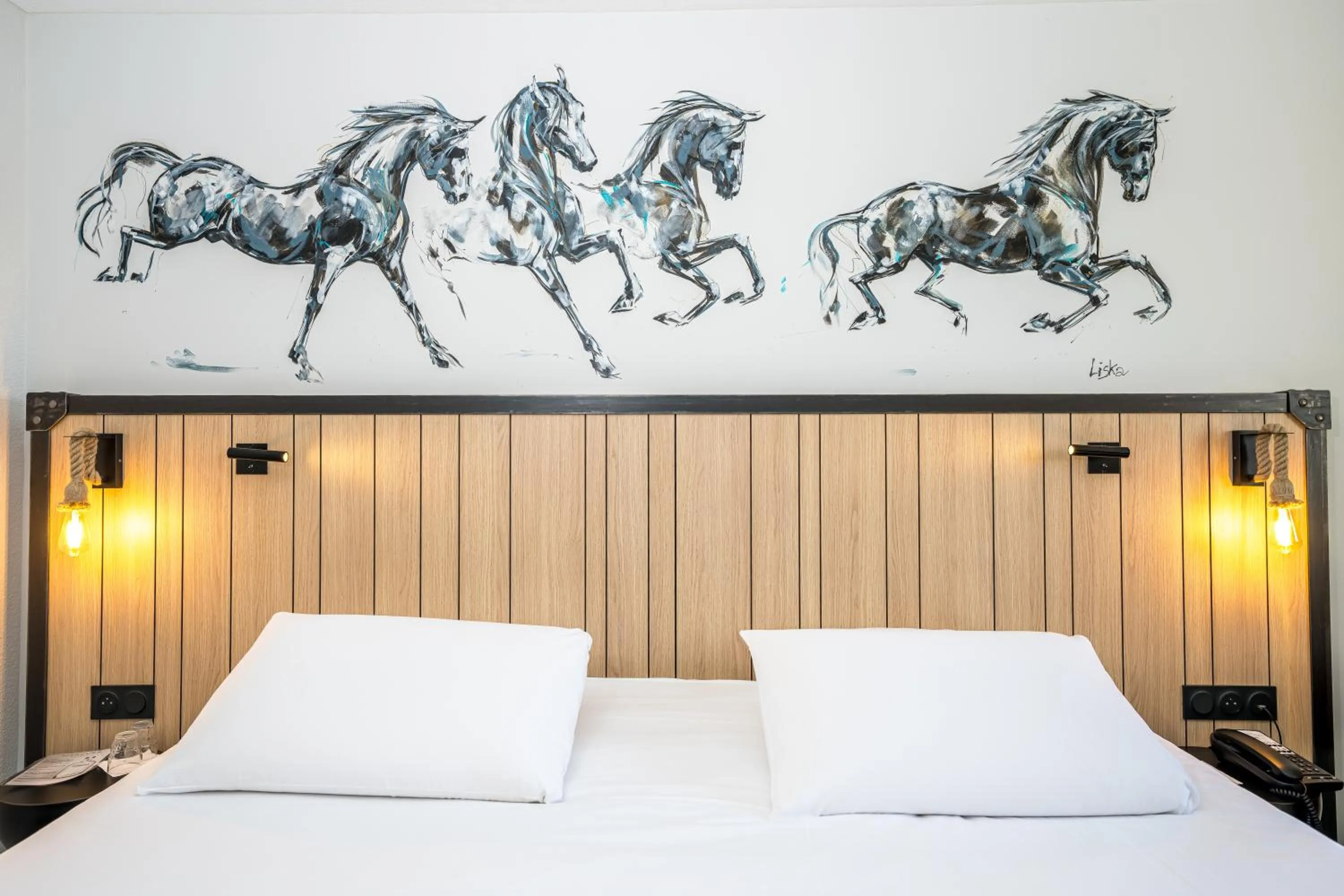 Decorative detail, Bed in Mercure Bords de Loire Saumur