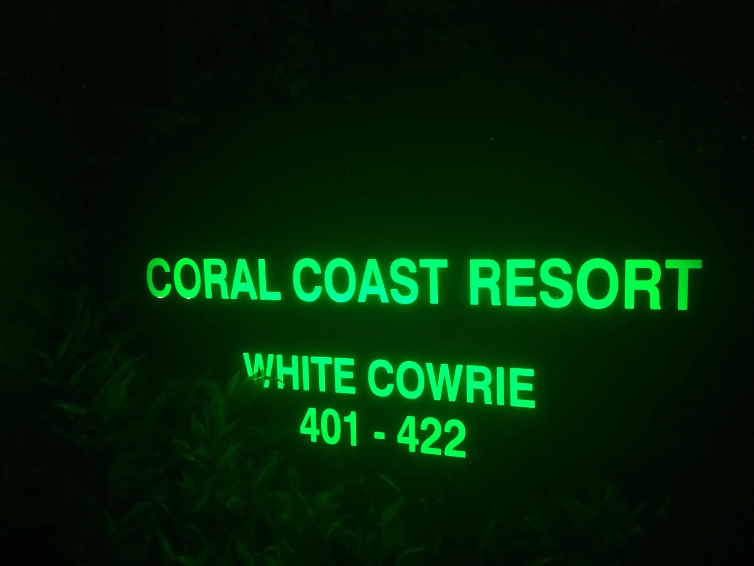 Property logo or sign in Paradise in the Tropics