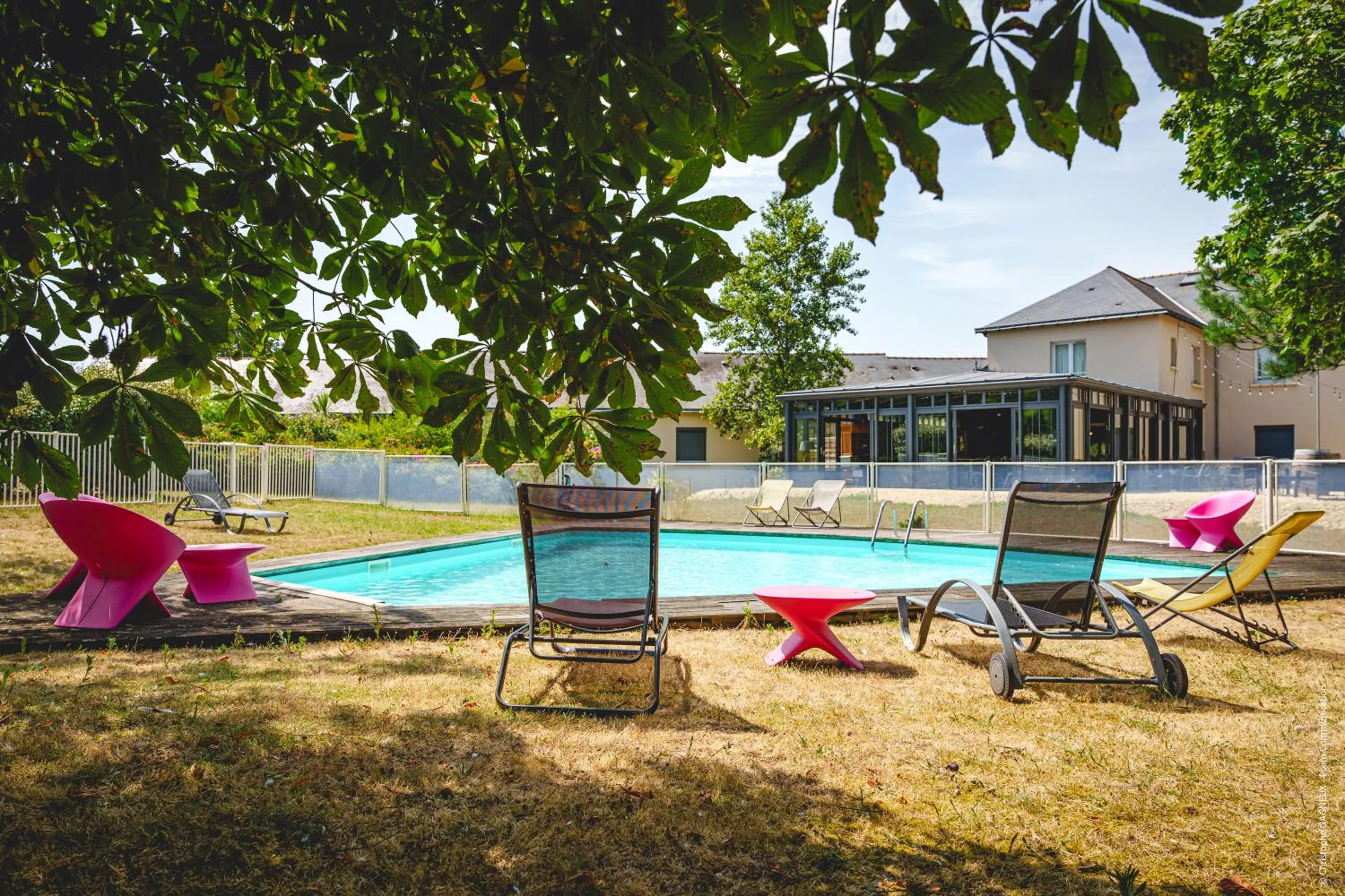 Swimming pool in The Originals City, Hôtel La Saulaie, Saumur Ouest