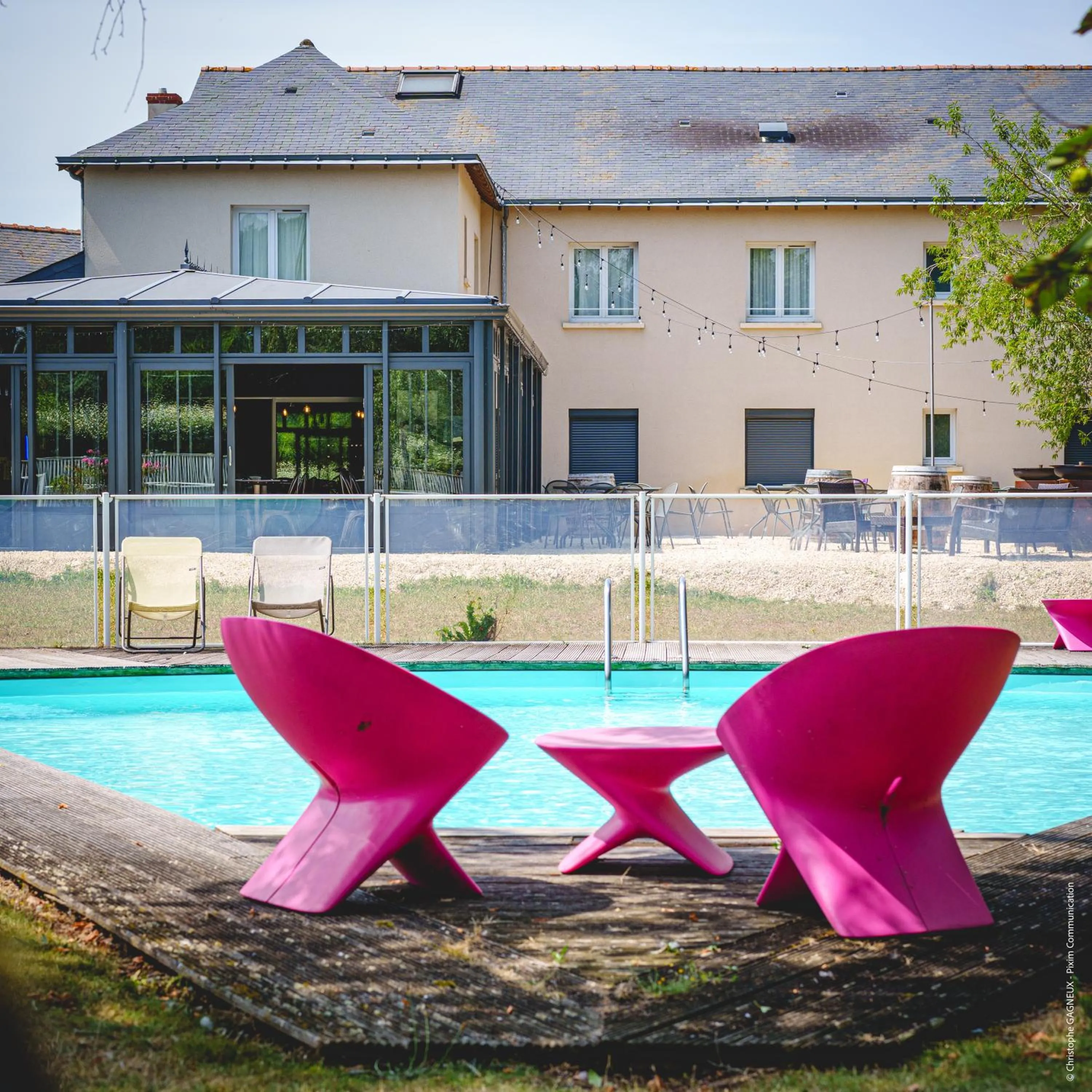 Swimming pool in The Originals City, Hôtel La Saulaie, Saumur Ouest