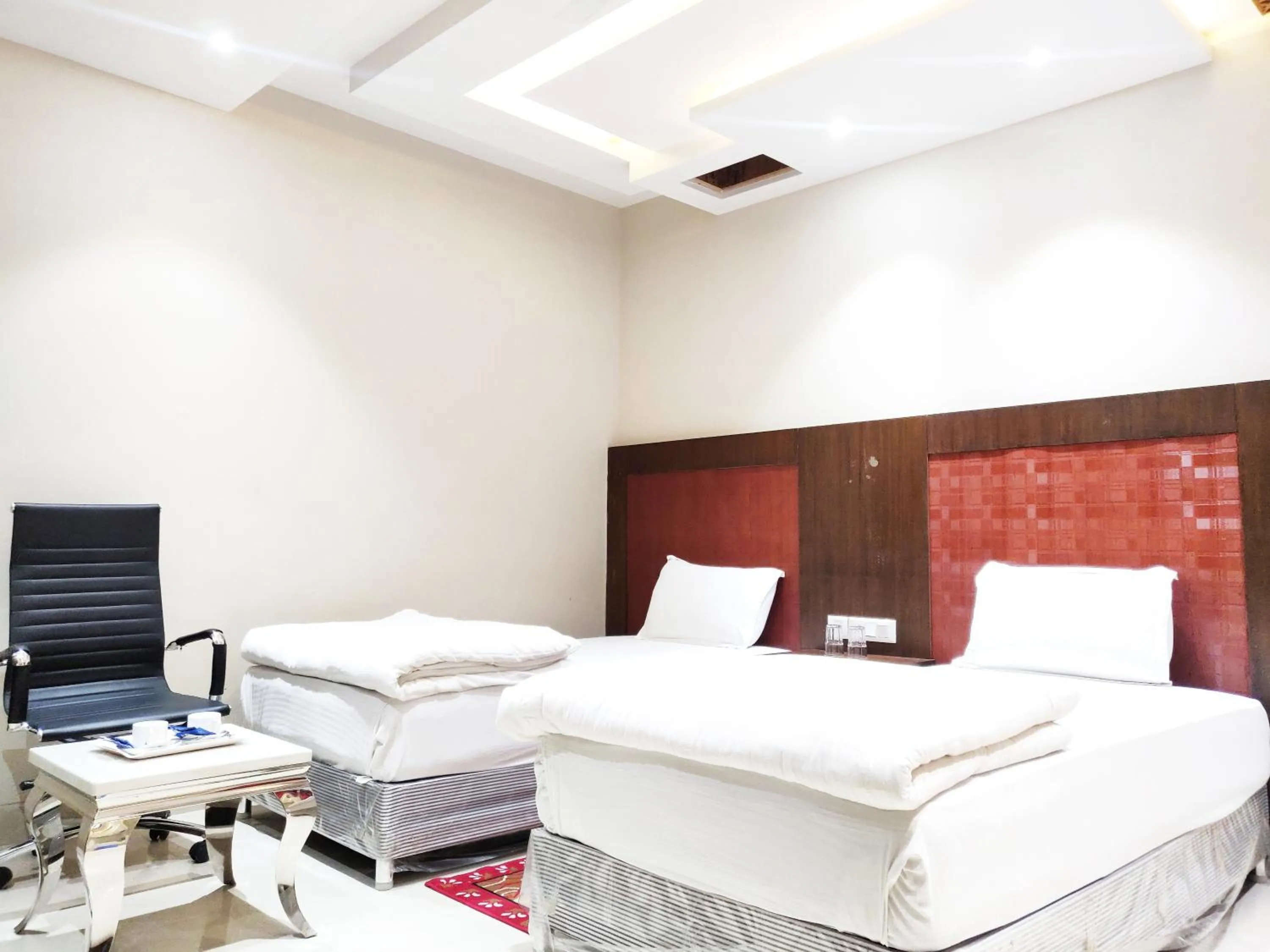 Bed in Bodhgaya Seven Inn Hotel n Restaurant