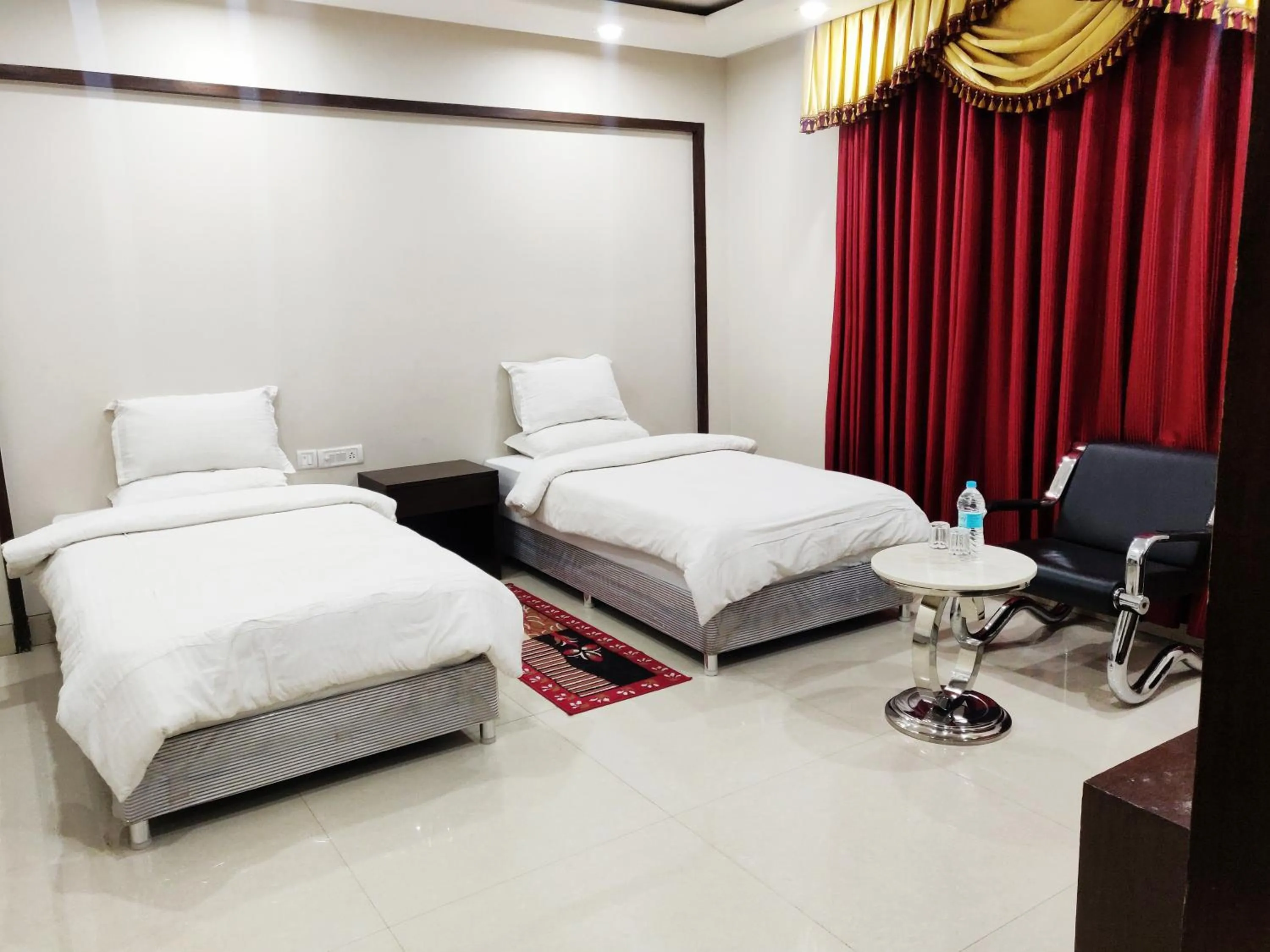 Bed in Bodhgaya Seven Inn Hotel n Restaurant