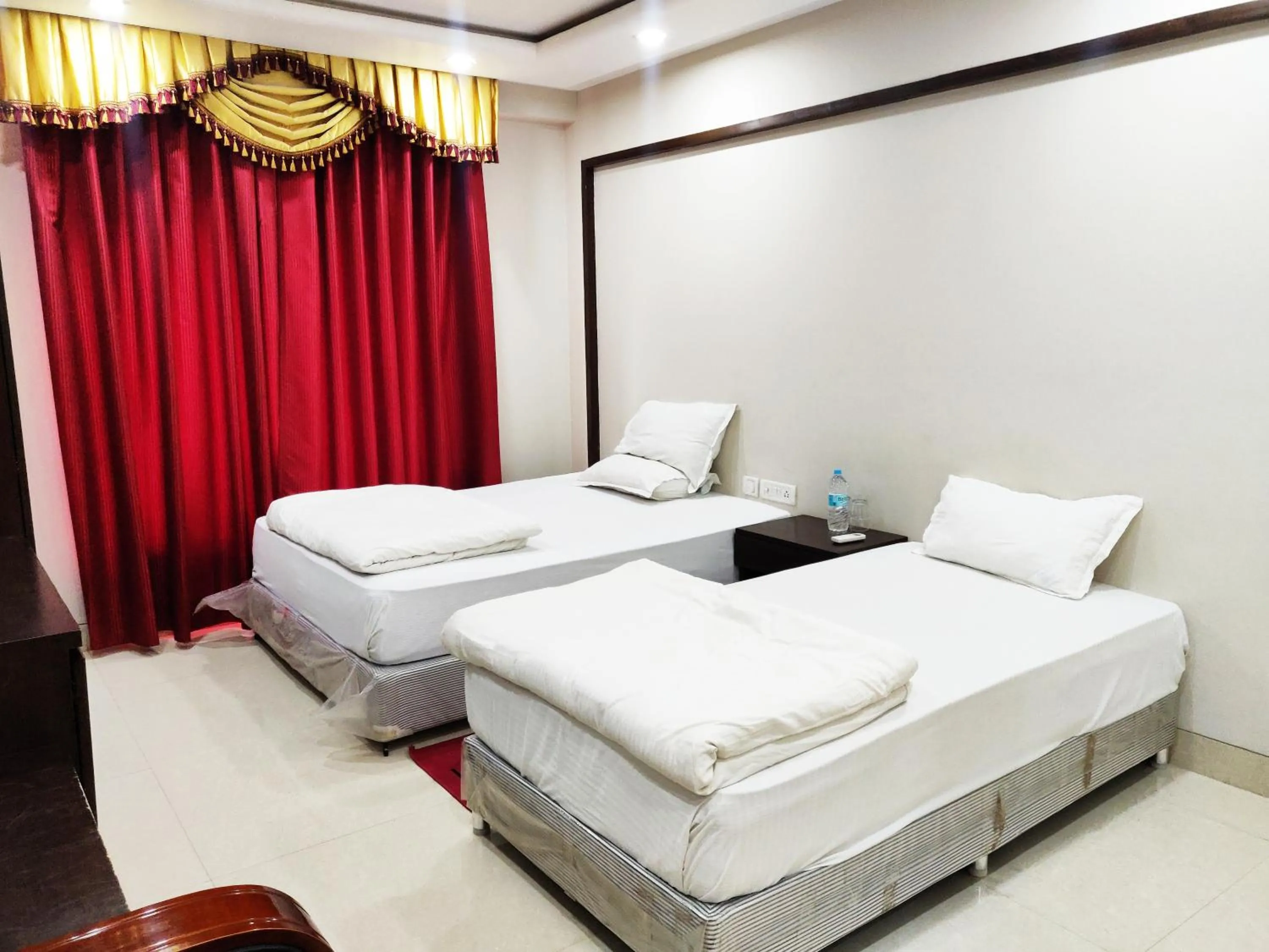 Bed in Bodhgaya Seven Inn Hotel n Restaurant