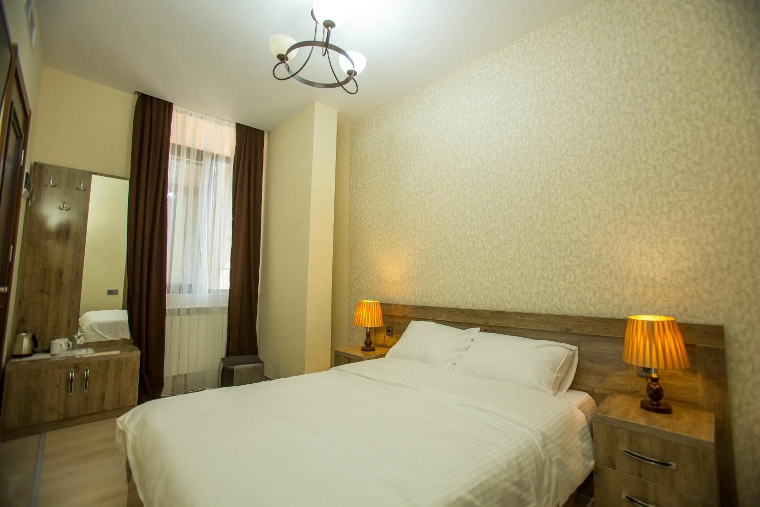 Photo of the whole room, Bed in Ire Palace