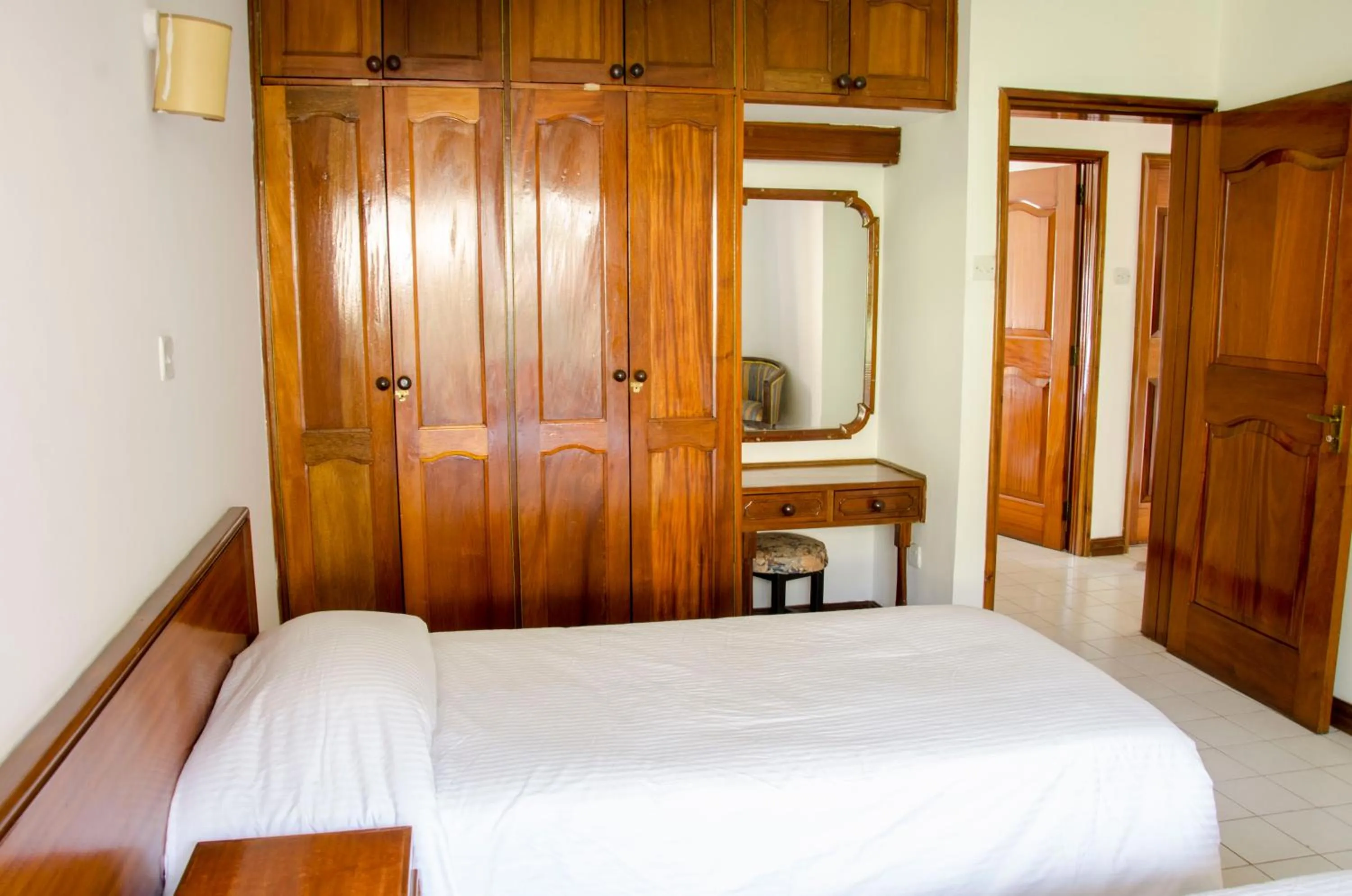 Bed in Golf Course Apartments