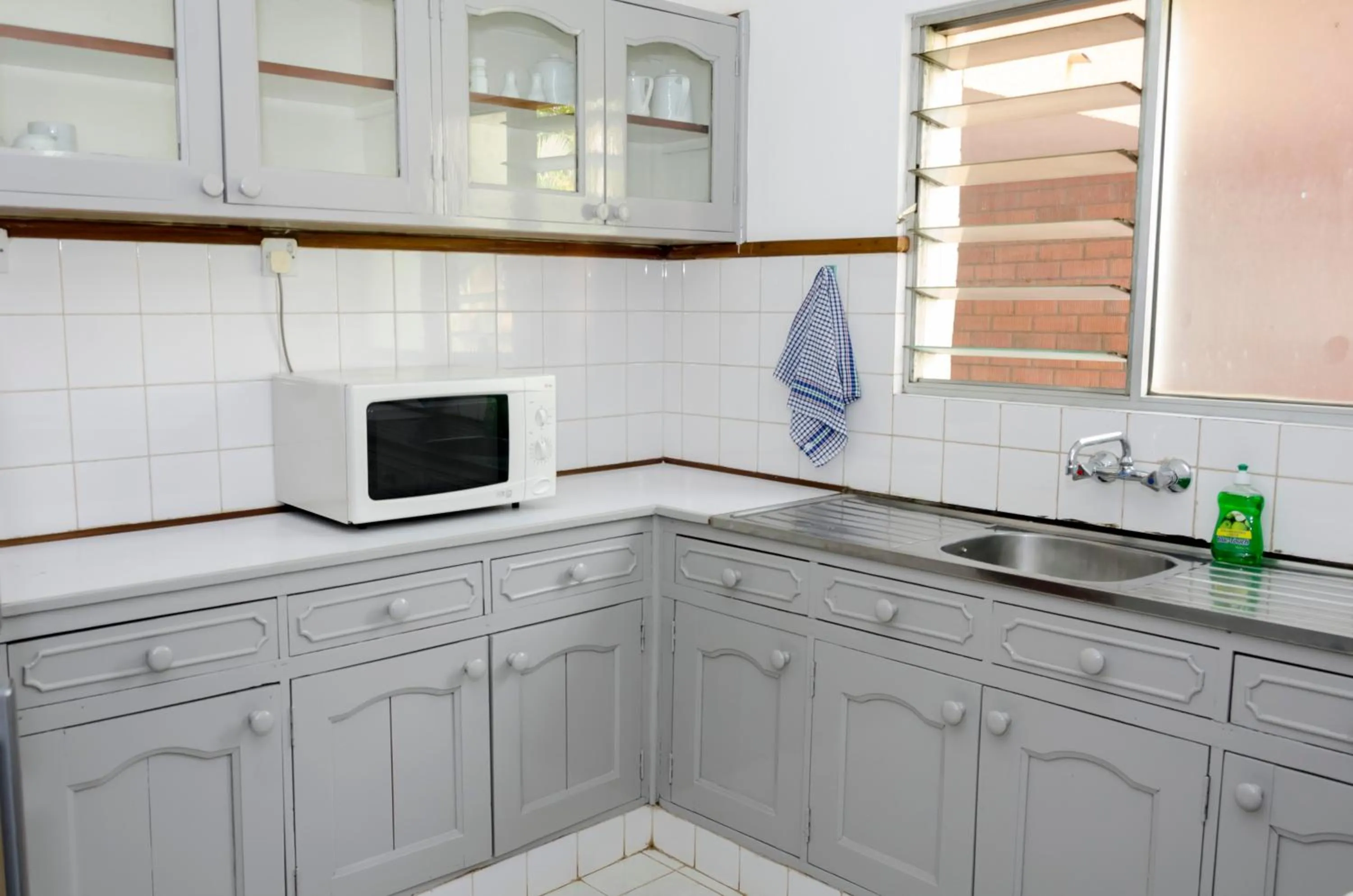 Kitchen or kitchenette in Golf Course Apartments