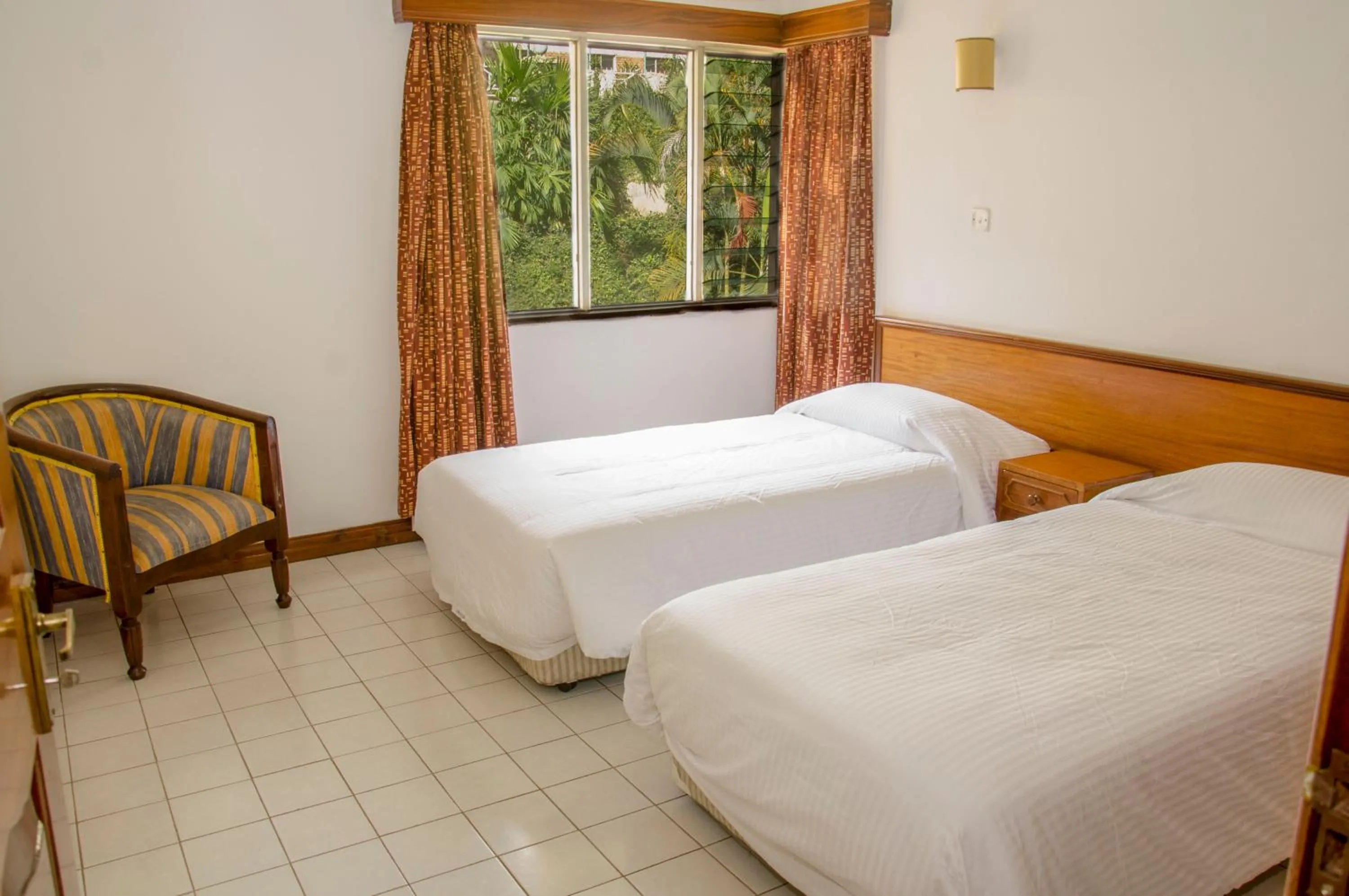 Bed in Golf Course Apartments