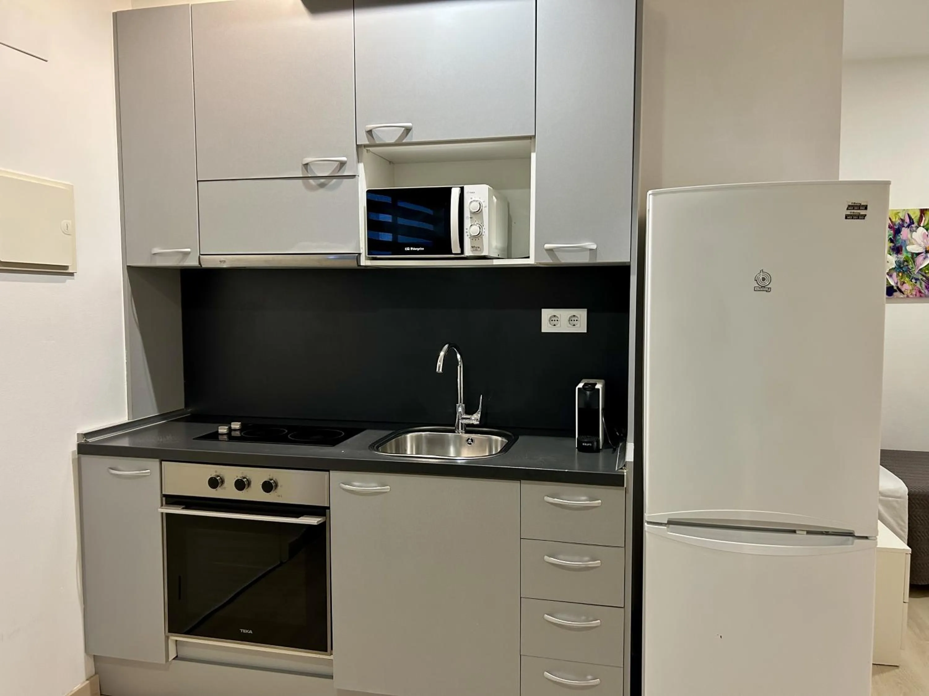 Kitchen or kitchenette in Apartahotel Baldiri