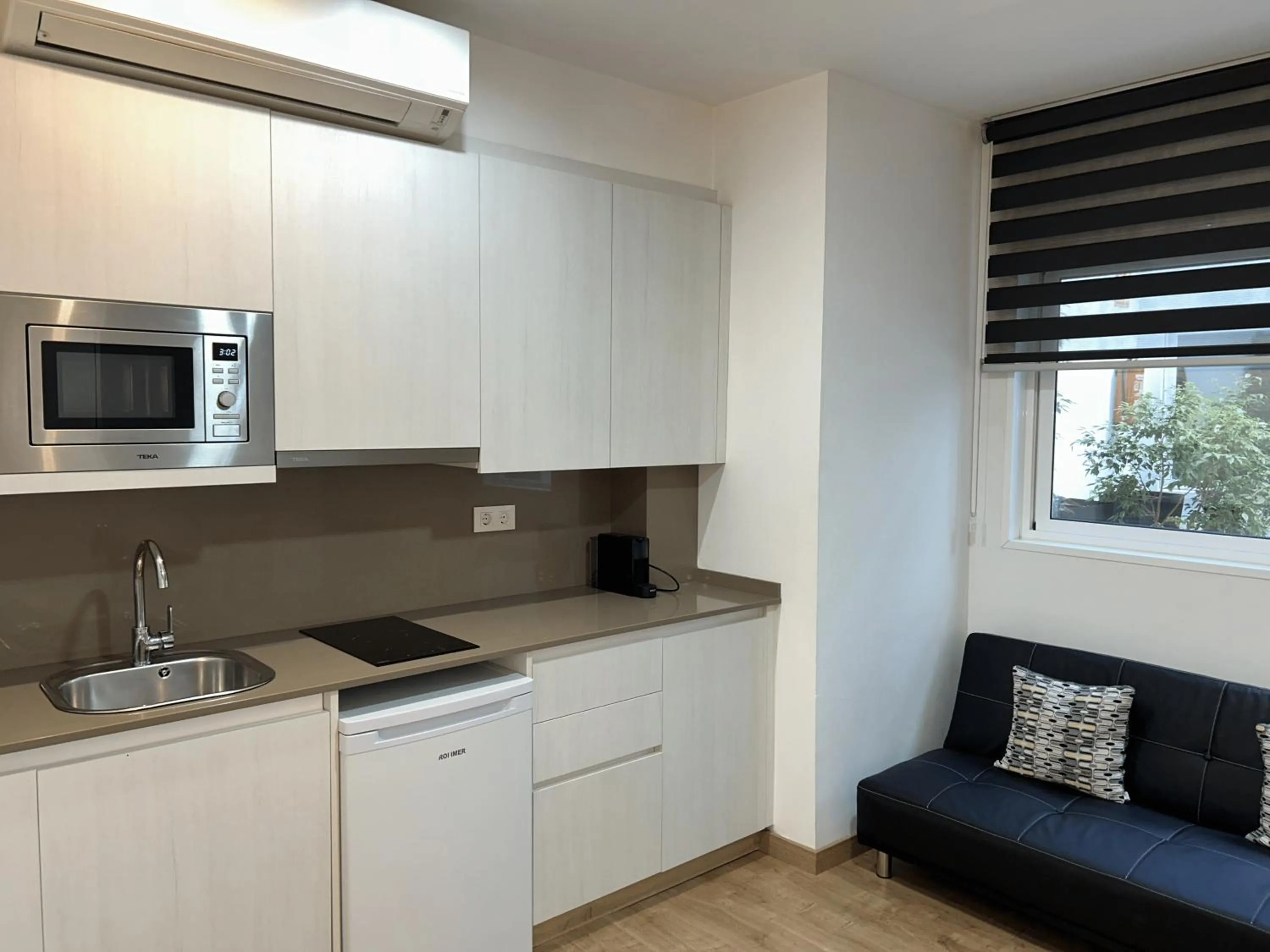 Kitchen or kitchenette in Apartahotel Baldiri