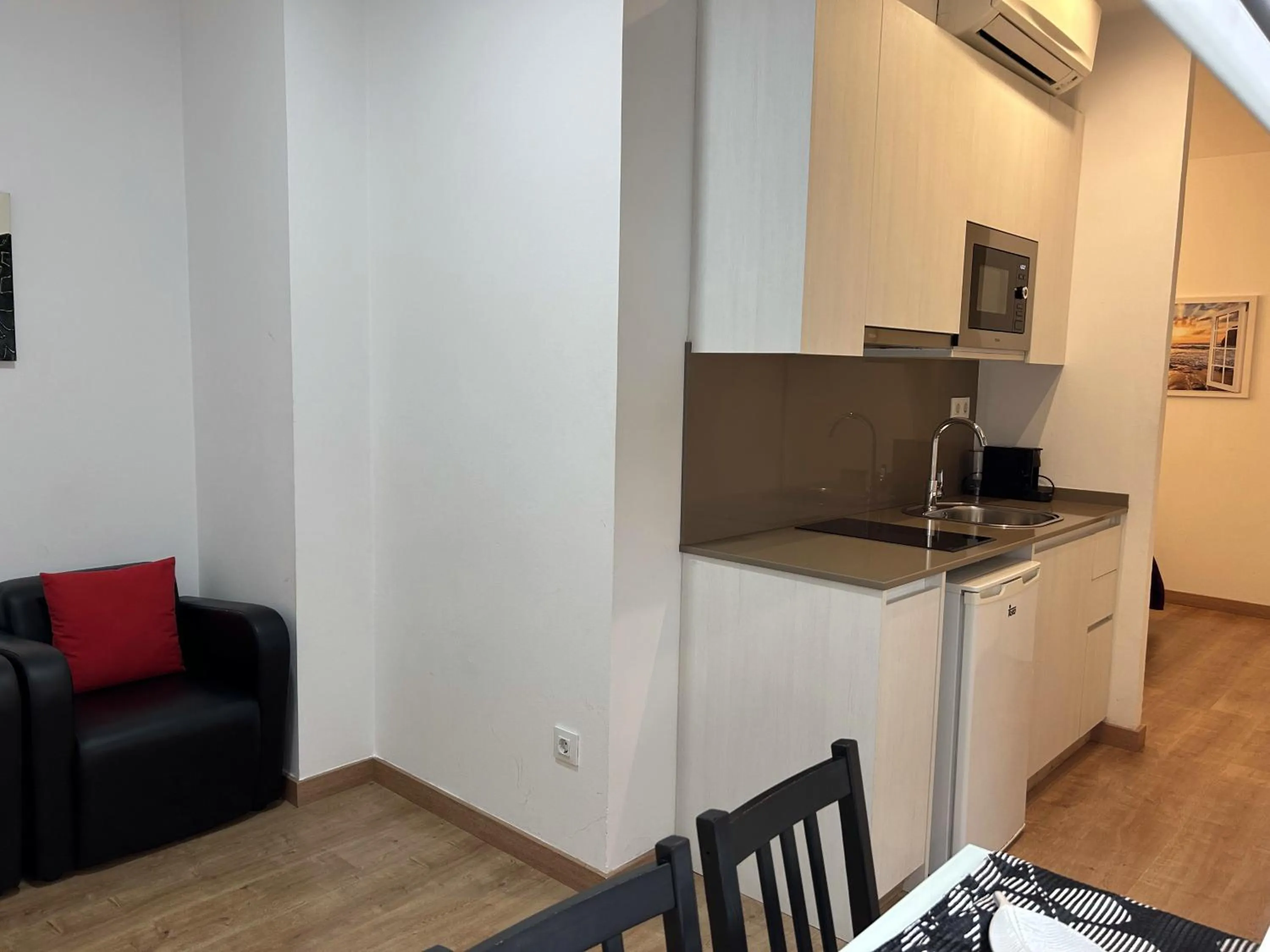 Kitchen or kitchenette in Apartahotel Baldiri