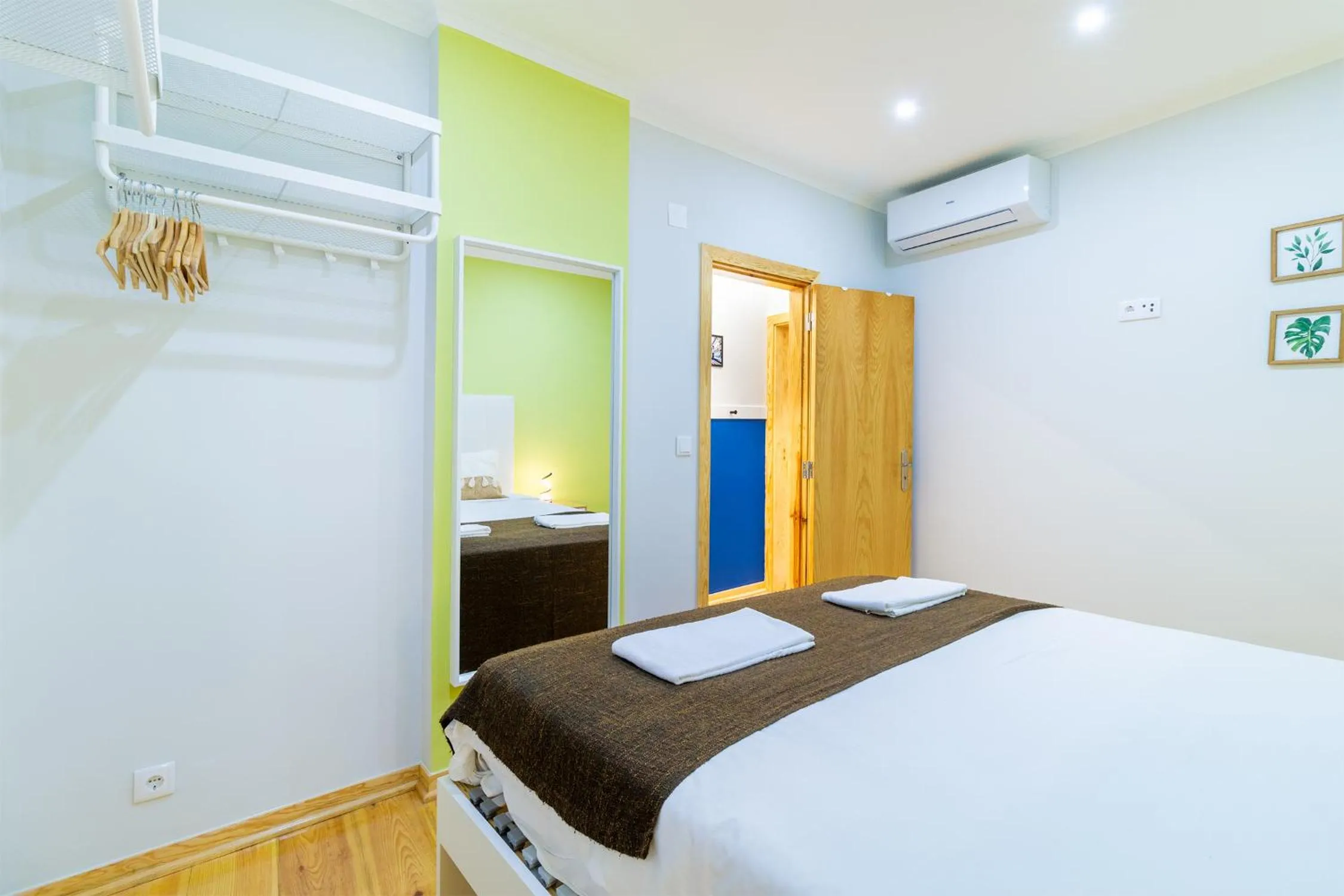 Bed in Diario de Noticias by Central Hill Apartments