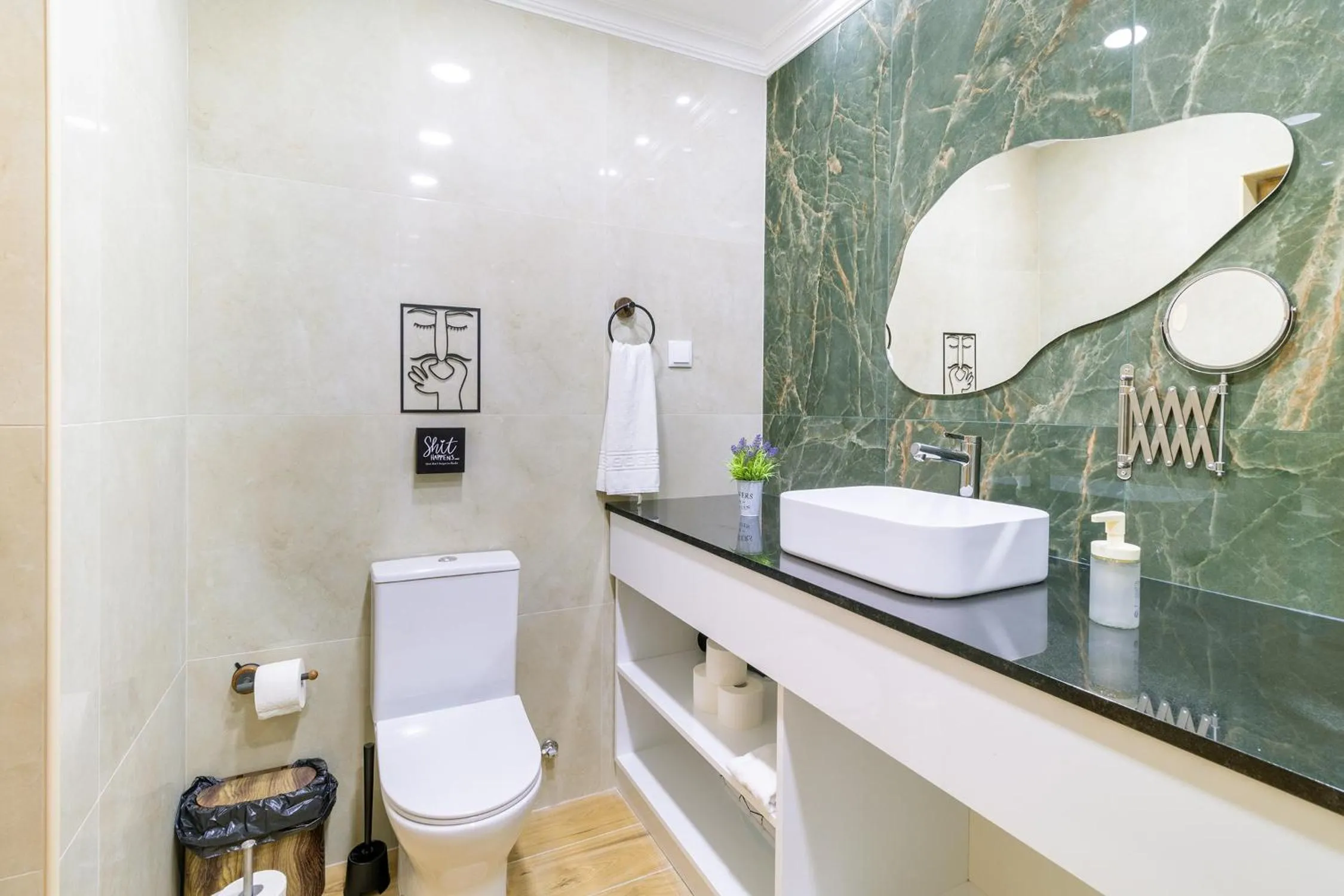 Bathroom in Diario de Noticias by Central Hill Apartments