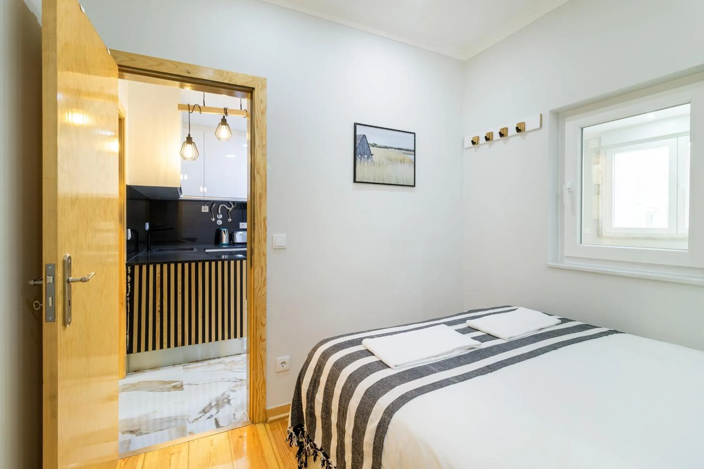 Bed in Diario de Noticias by Central Hill Apartments