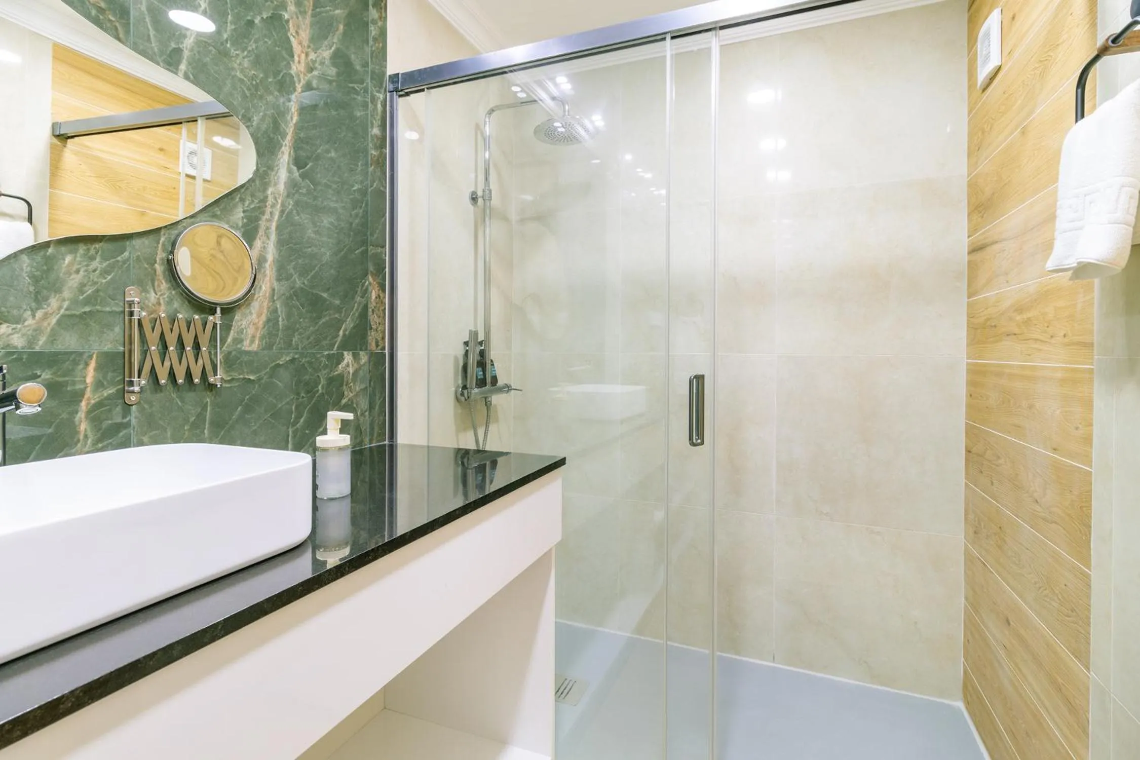 Bathroom in Diario de Noticias by Central Hill Apartments
