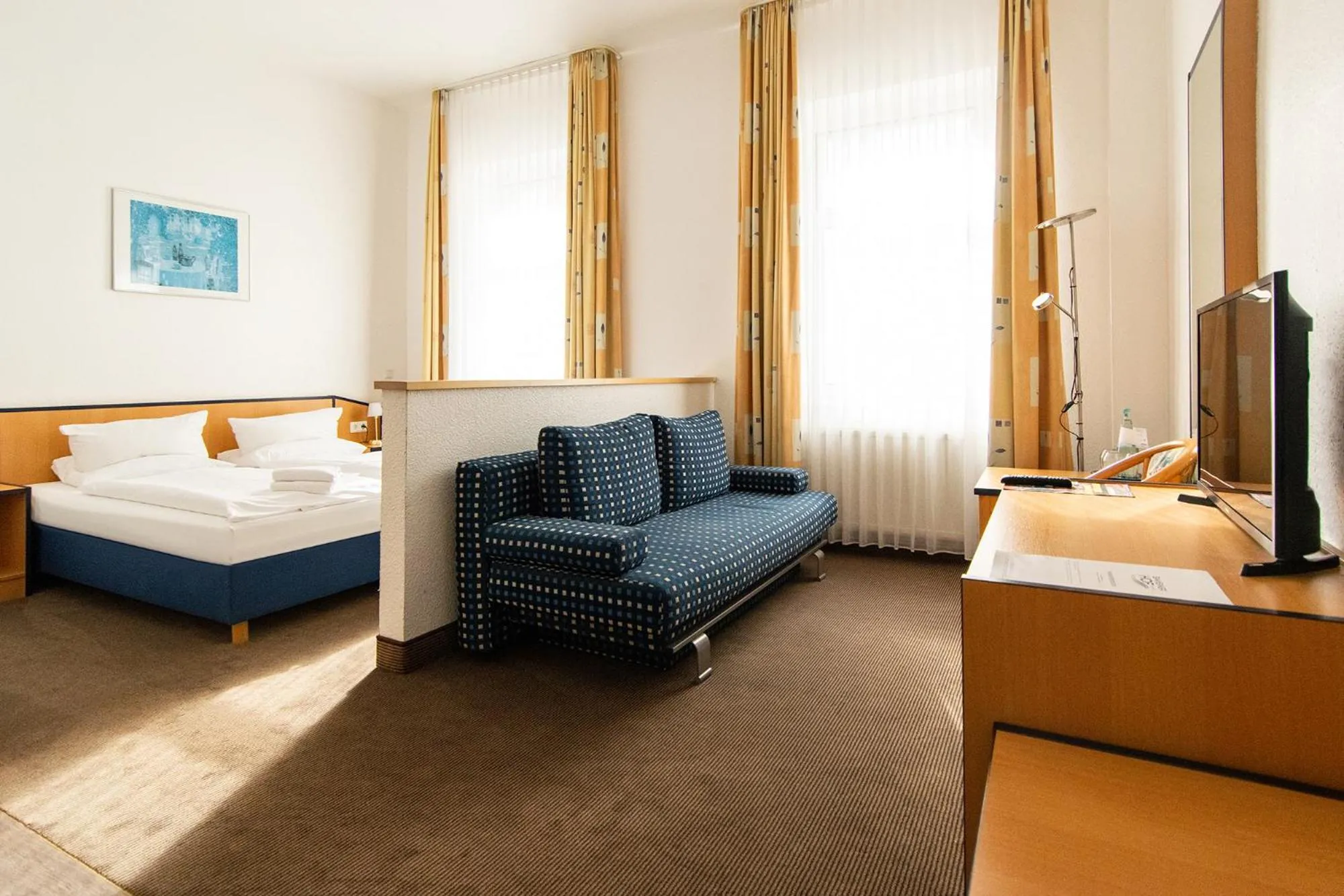 Photo of the whole room, Bed in Strandhotel Bansiner Hof