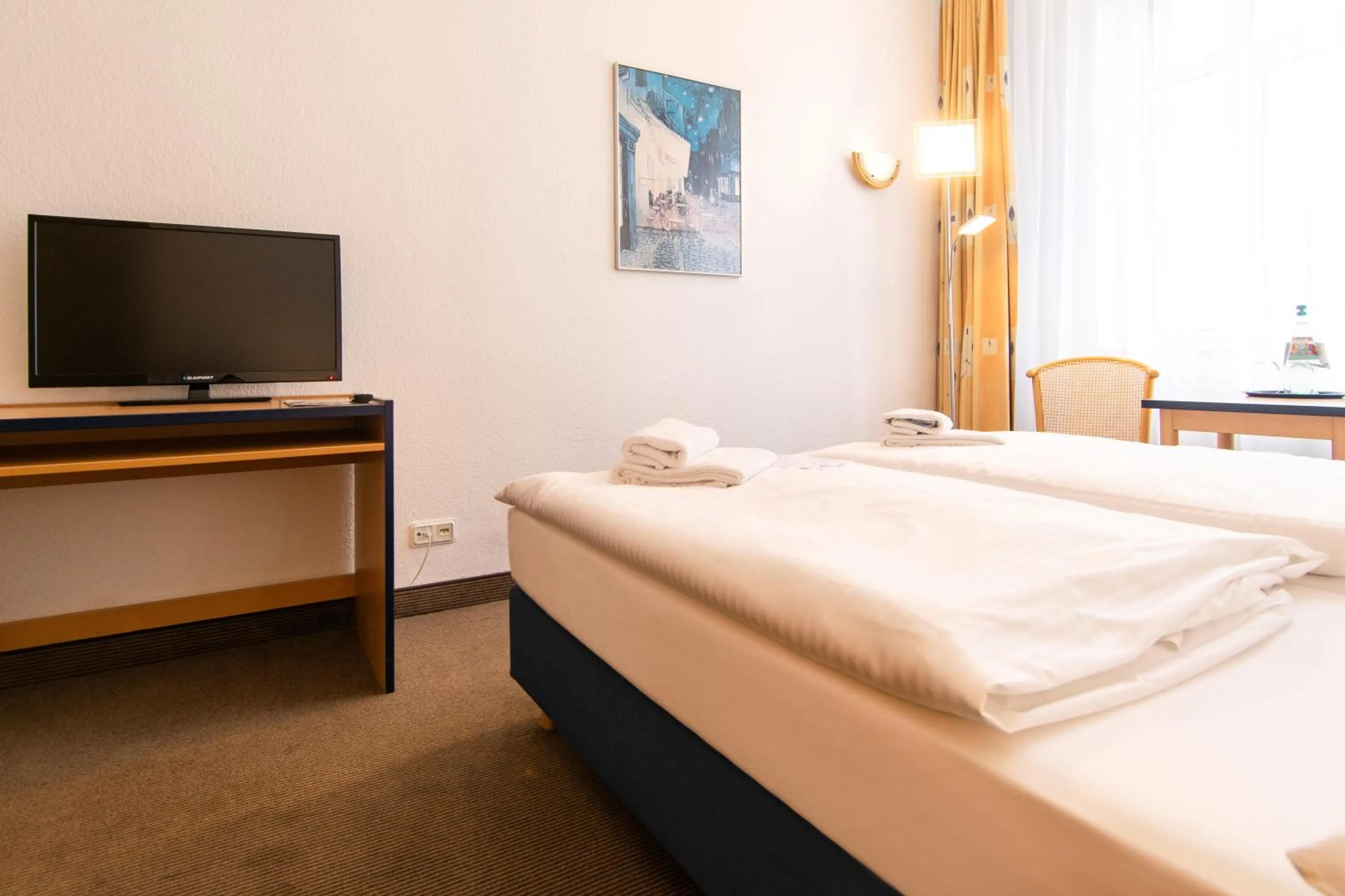 Photo of the whole room, Bed in Strandhotel Bansiner Hof