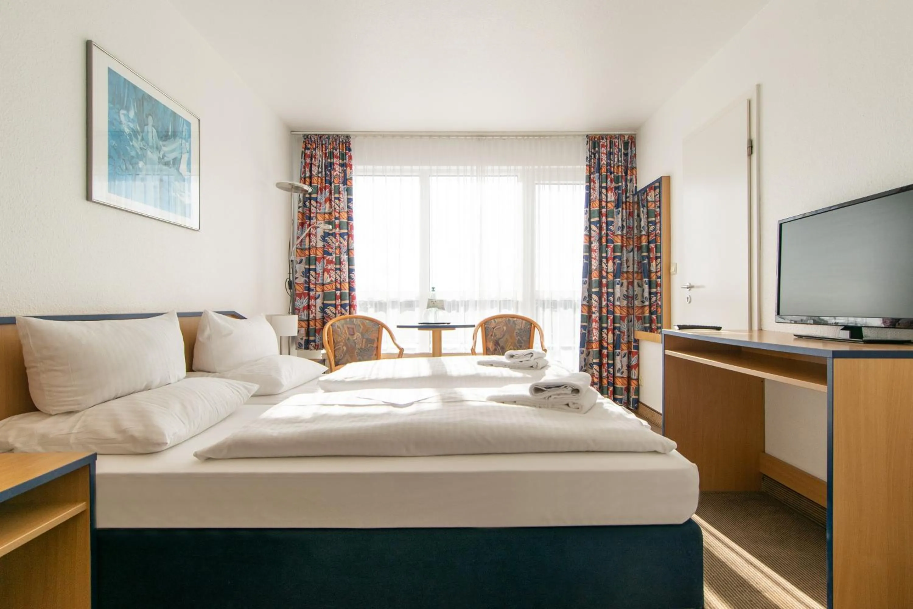 Photo of the whole room, Bed in Strandhotel Bansiner Hof