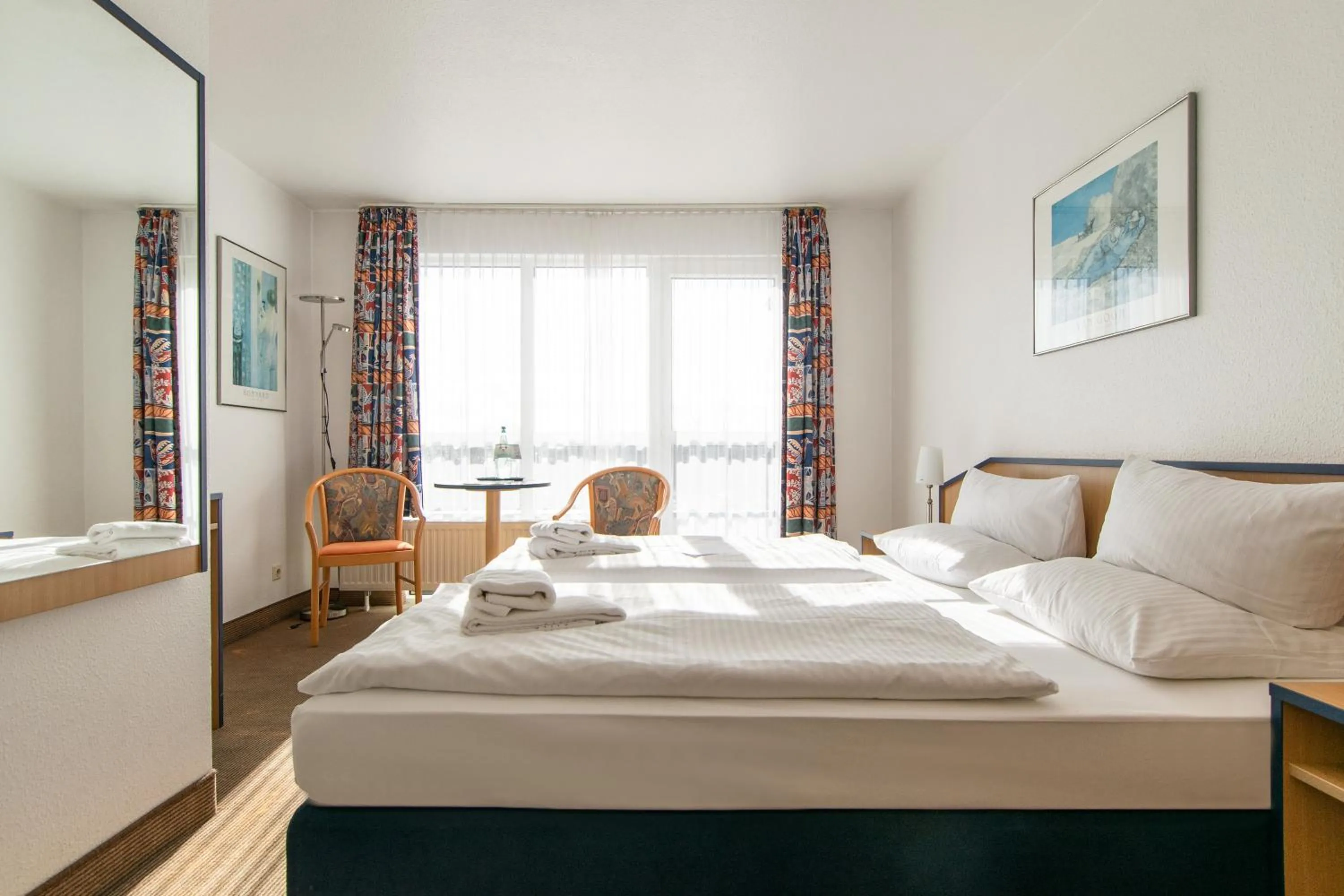 Photo of the whole room, Bed in Strandhotel Bansiner Hof
