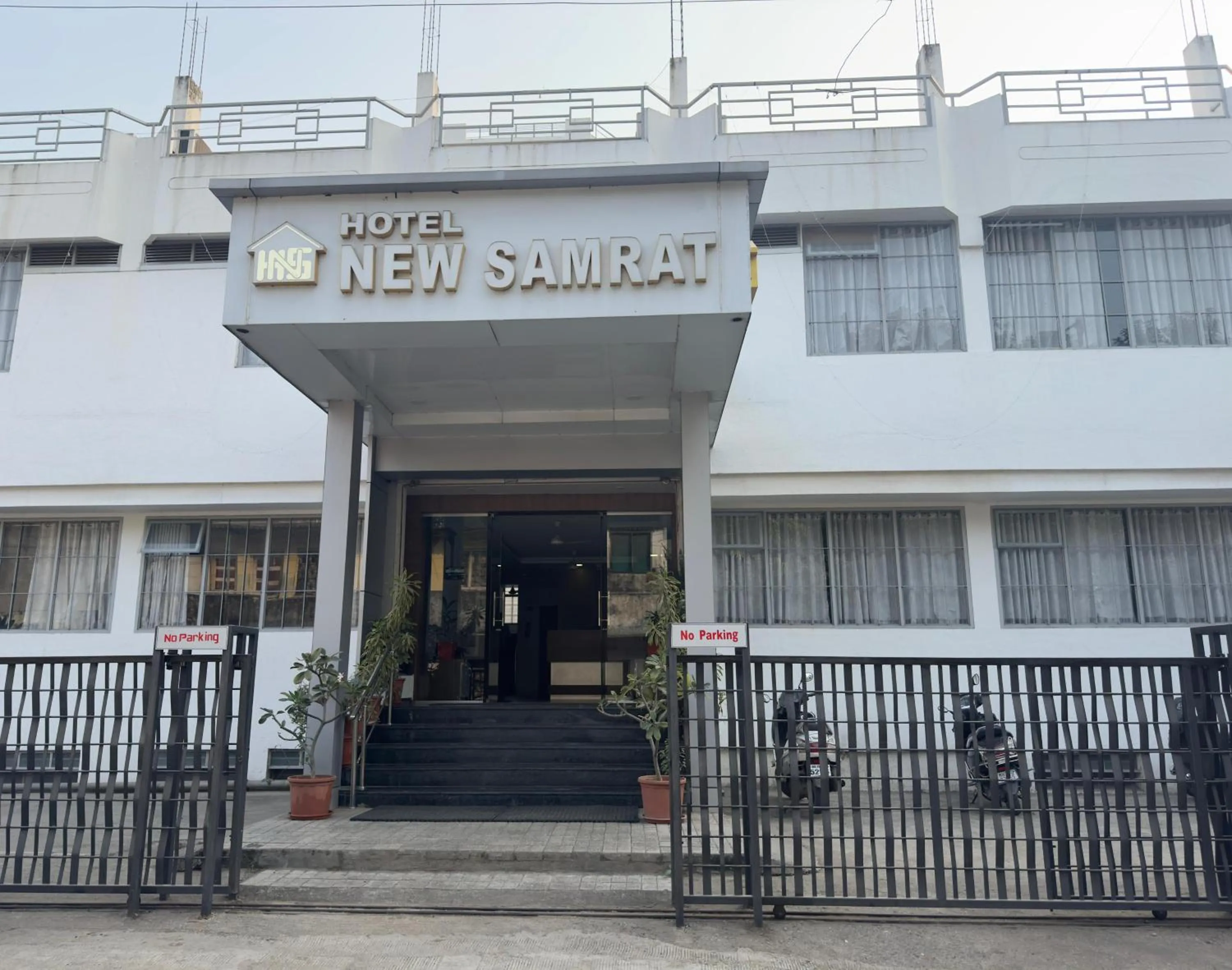 Property logo or sign in Hotel New Samrat