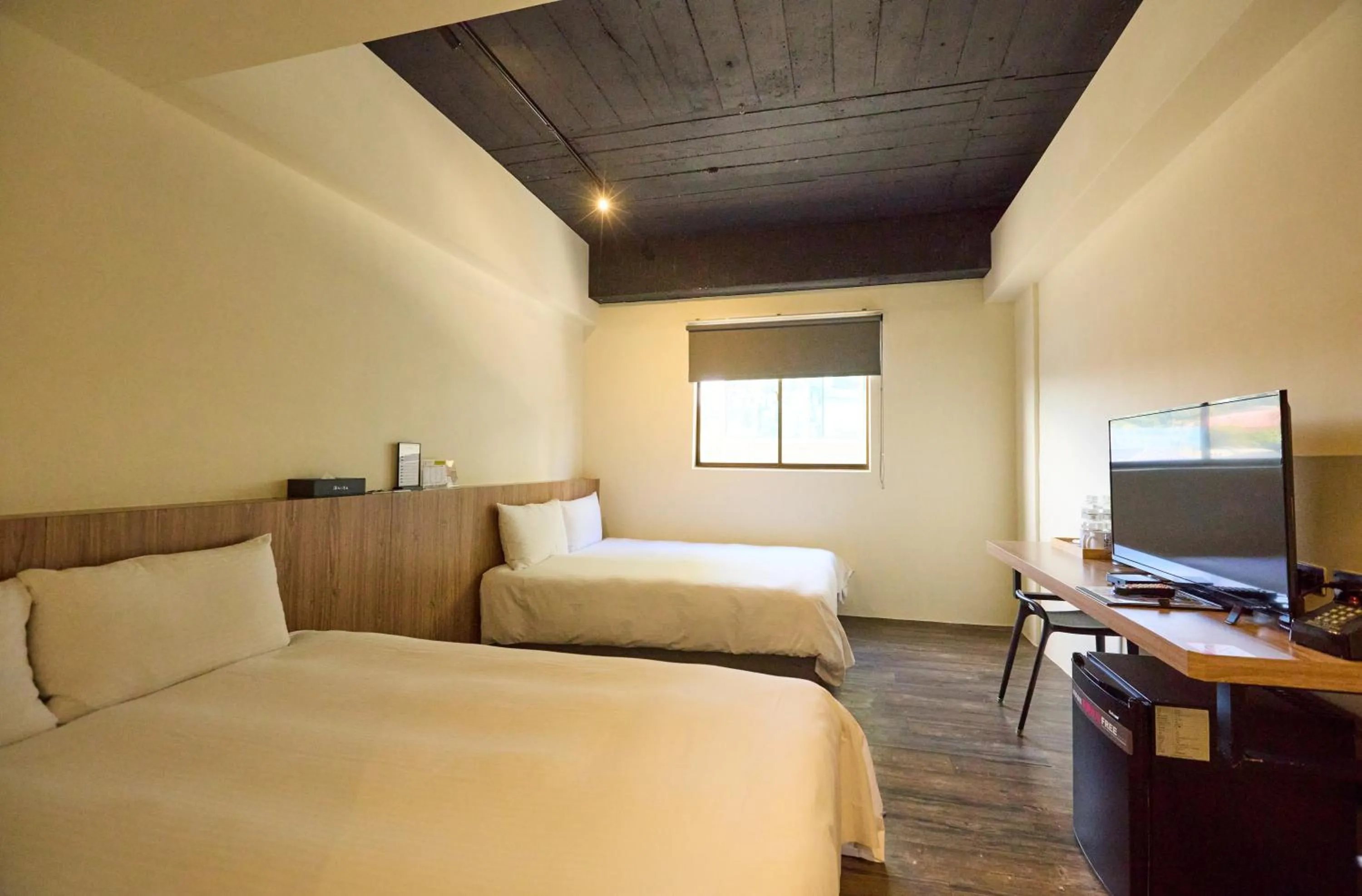 Bed in Traveller Inn Tiehua Cultural and Creative Hotel II