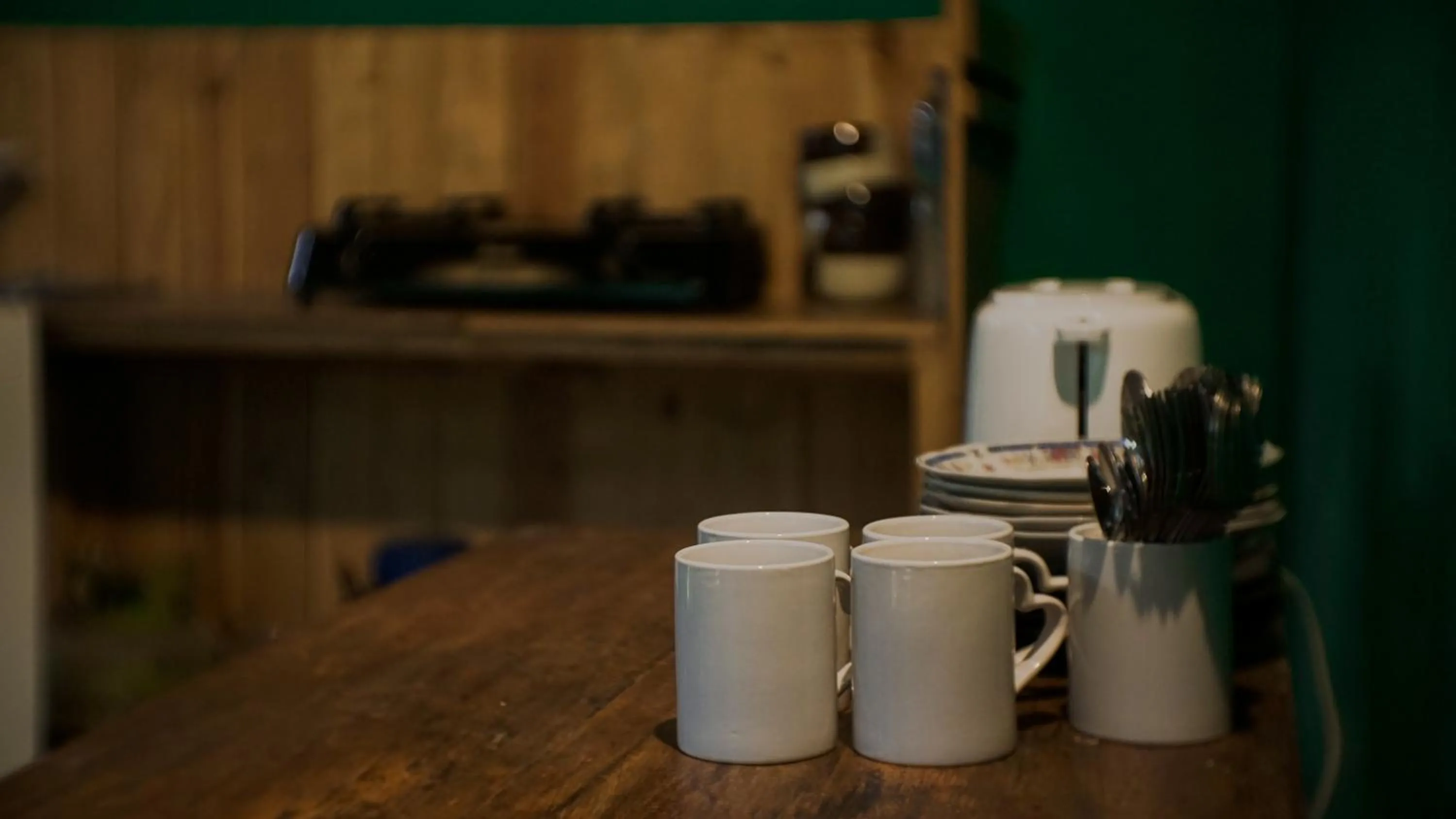 Communal lounge/ TV room in Glory Homestay