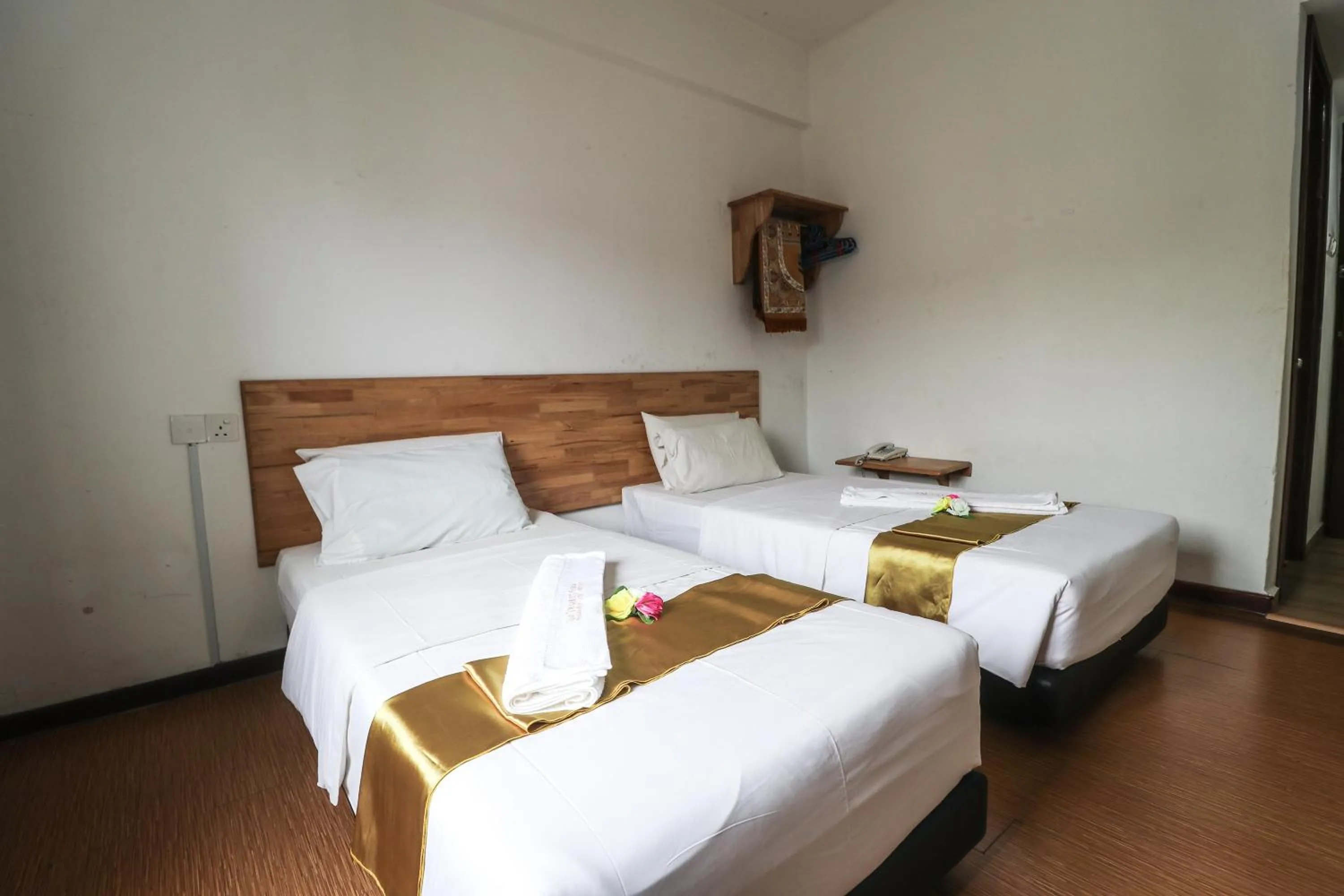 Bed in AM Transit Inn Kuala Terengganu