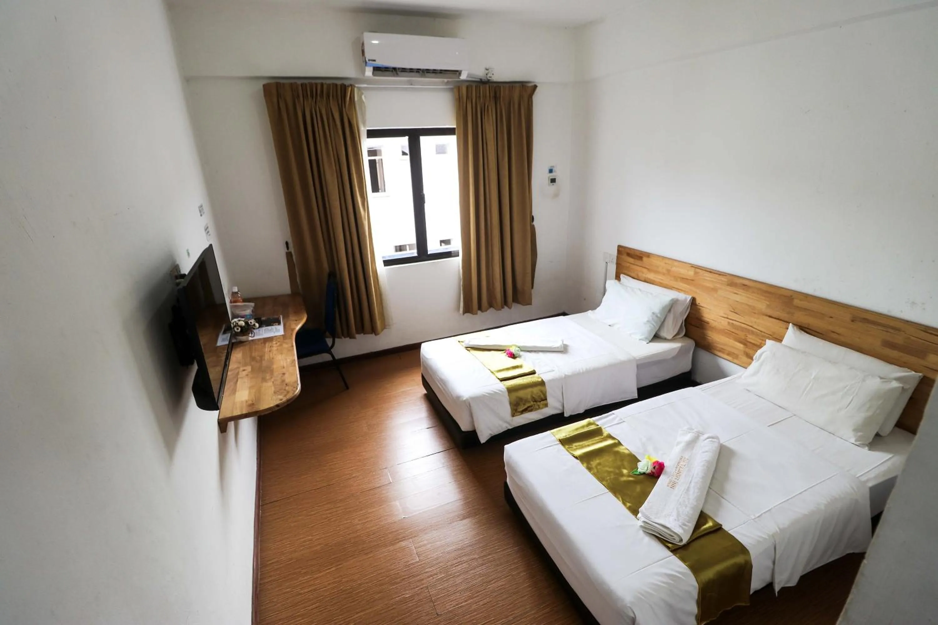 Bed in AM Transit Inn Kuala Terengganu