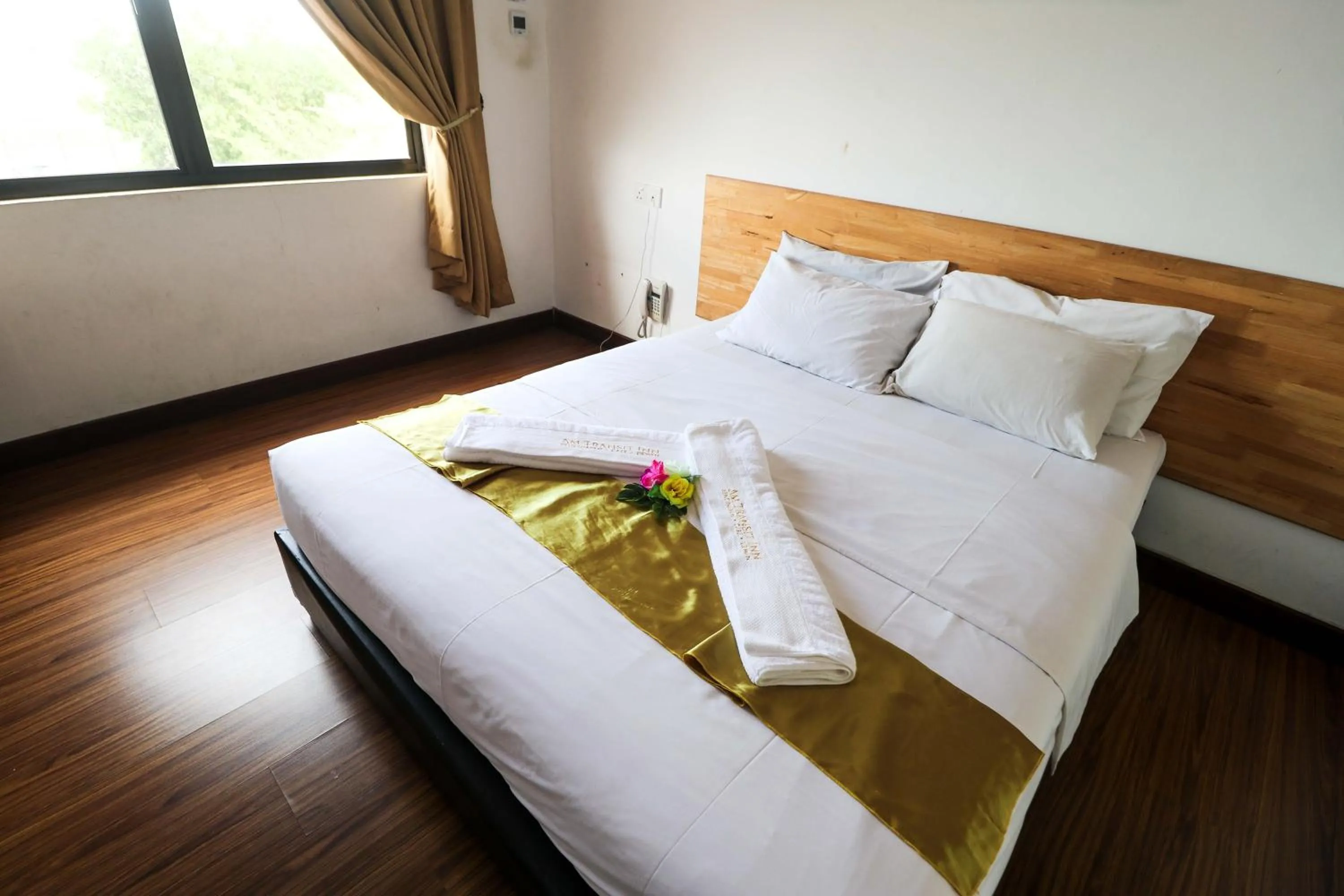 Bed in AM Transit Inn Kuala Terengganu