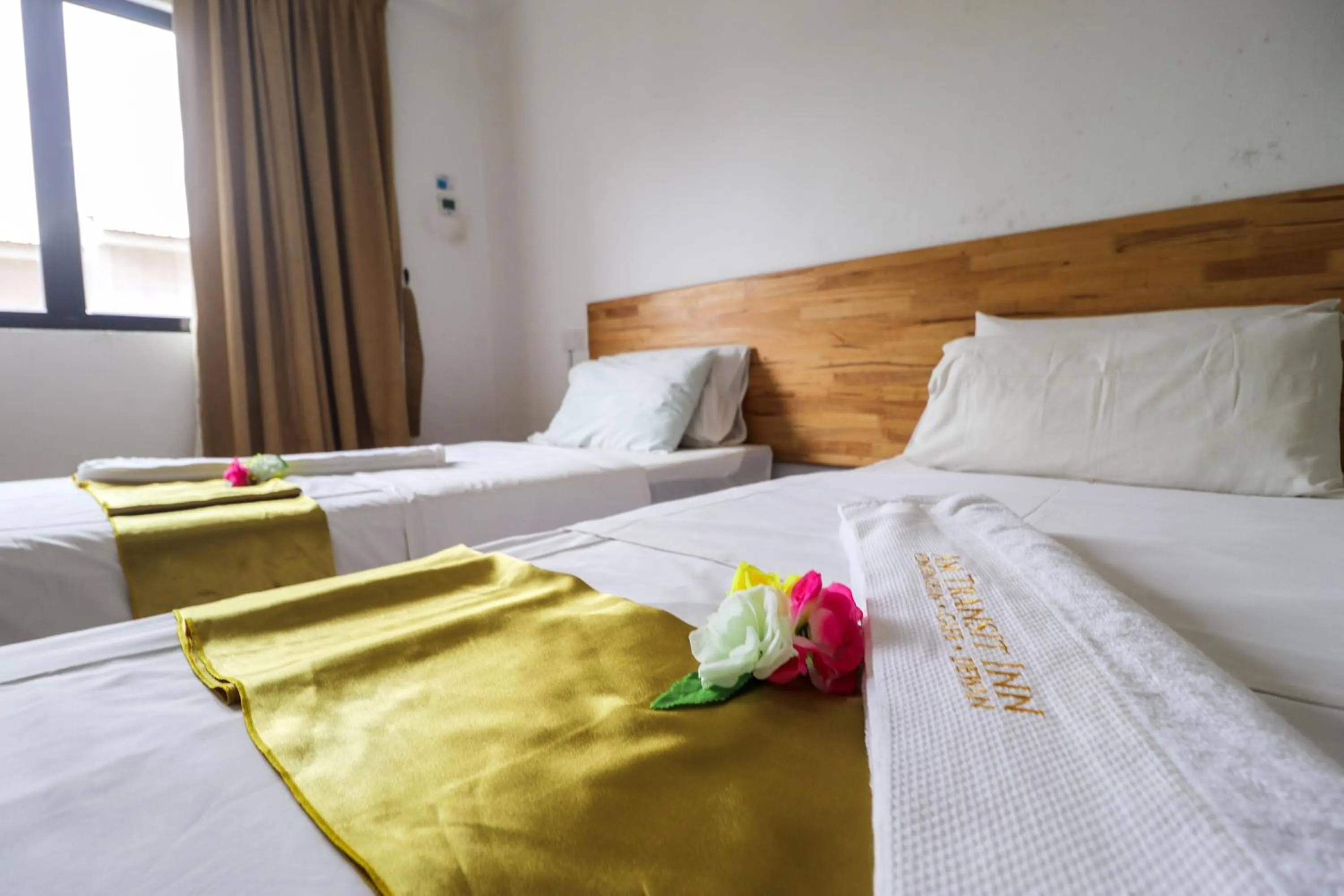 Bed in AM Transit Inn Kuala Terengganu