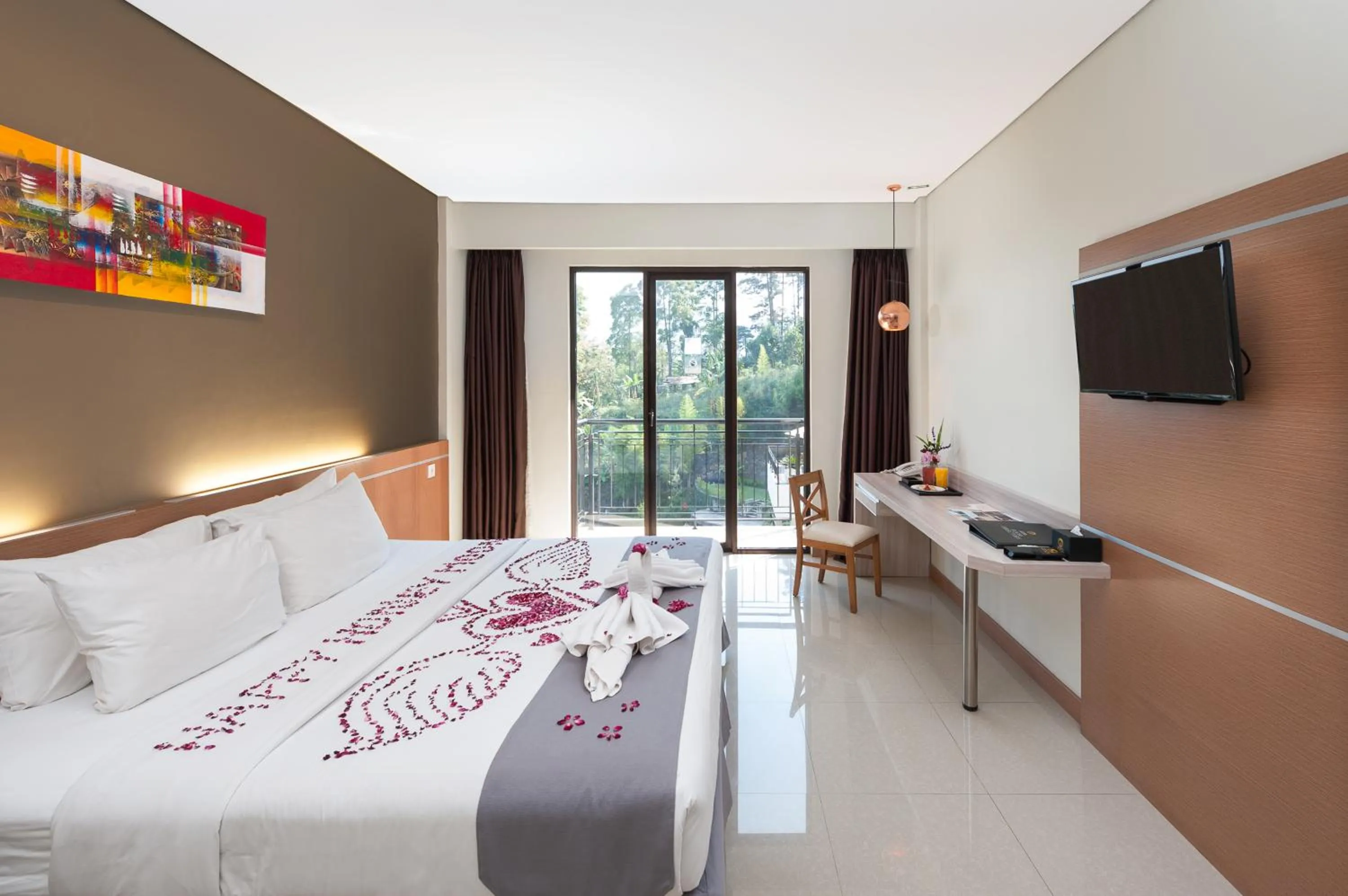 Photo of the whole room, Bed in Nava Hotel Tawangmangu