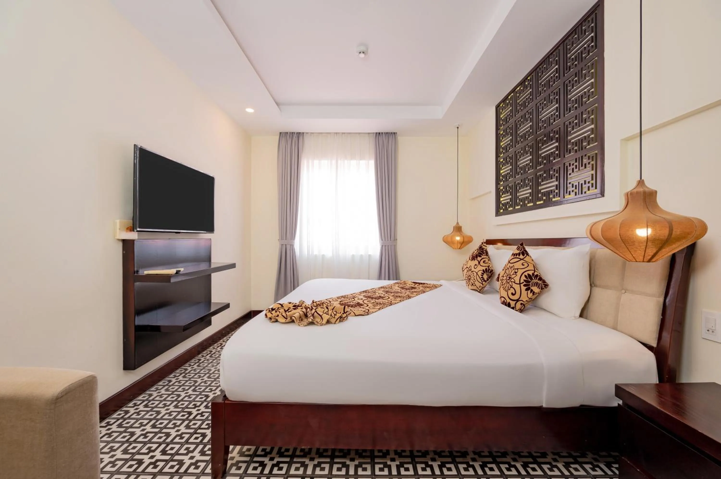 Bed in Hoi An Canal House