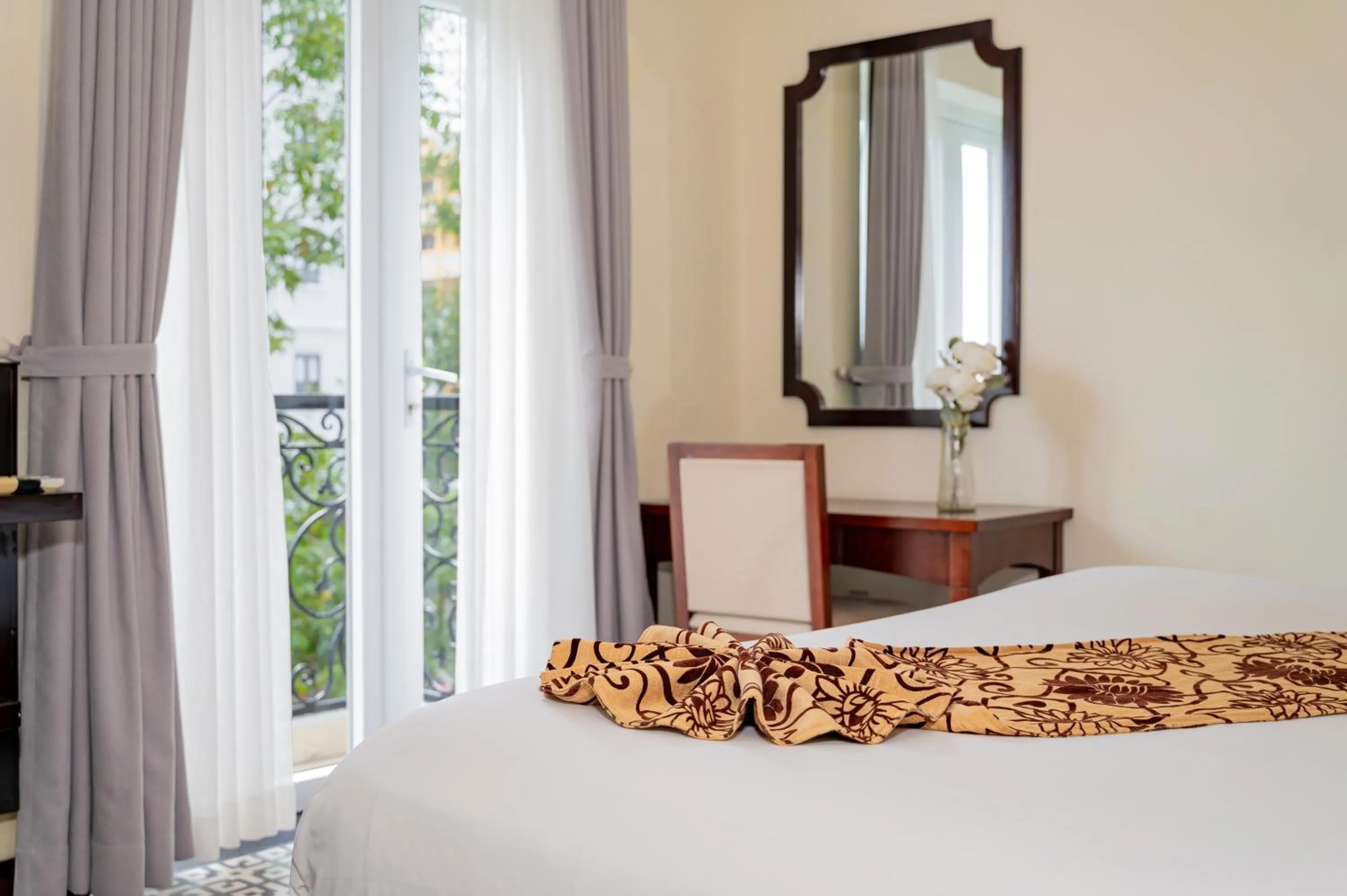 Bed in Hoi An Canal House