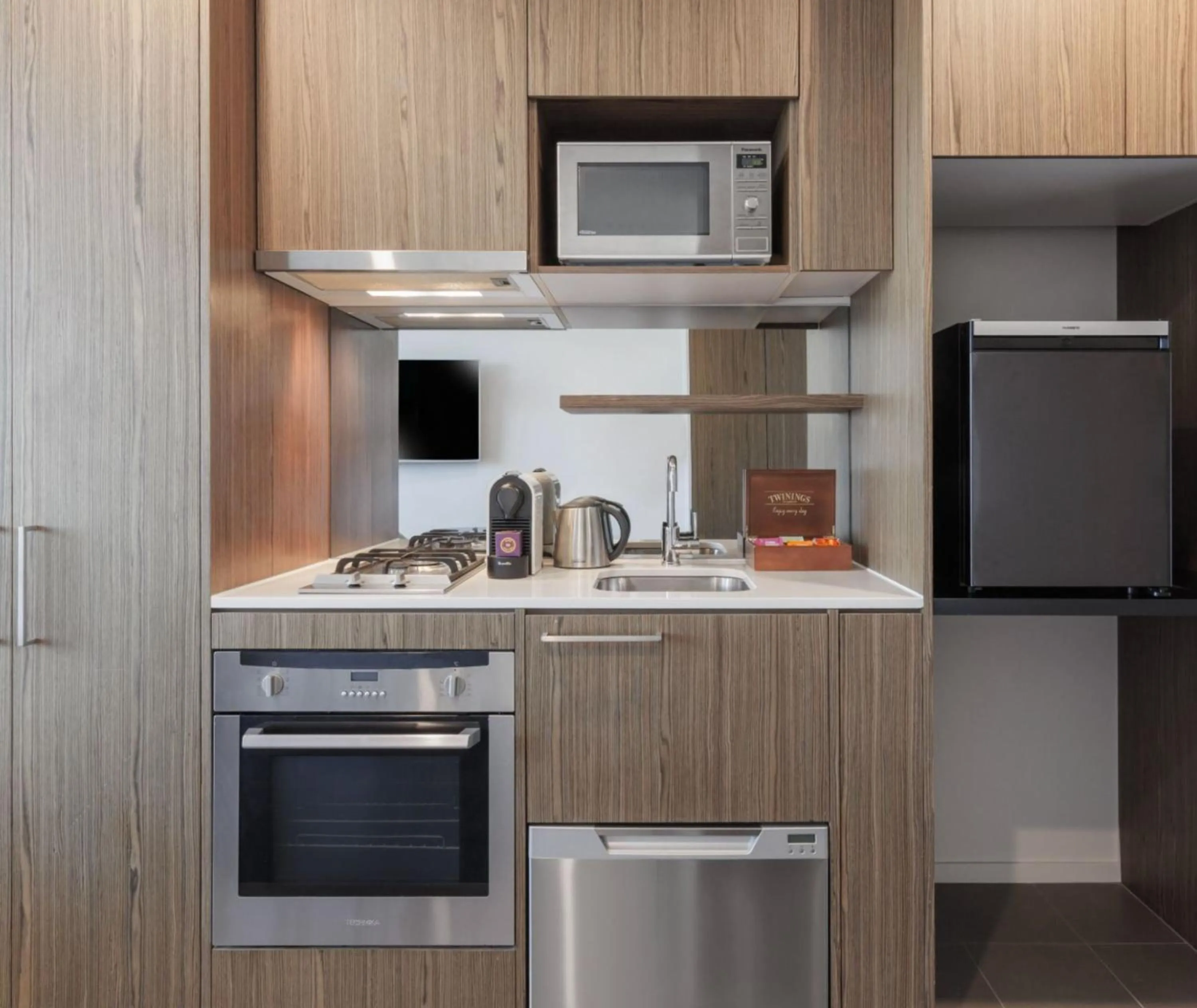 Kitchen or kitchenette in Avani Melbourne Jazz Corner Residences
