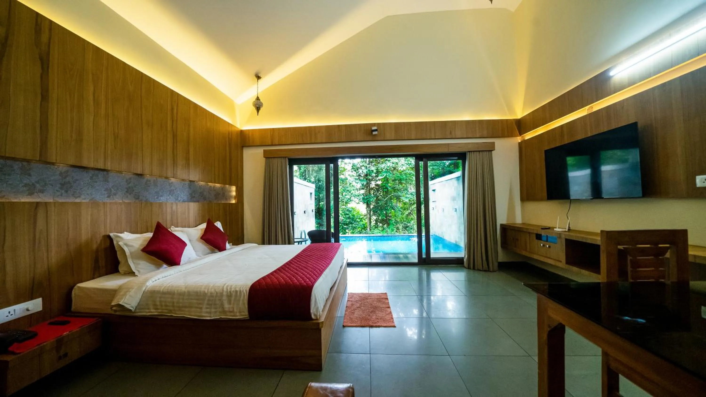 Bed in Vythiri Holiday Resort, Wayanad