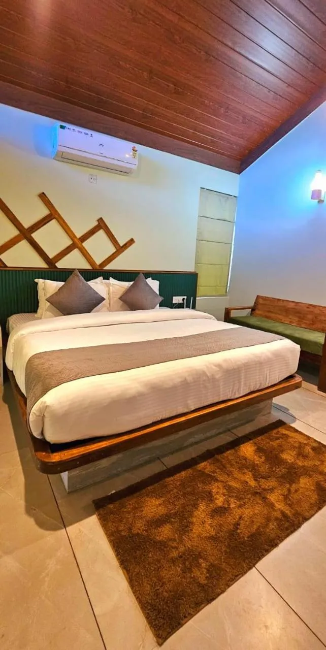 Bed in Vythiri Holiday Resort, Wayanad