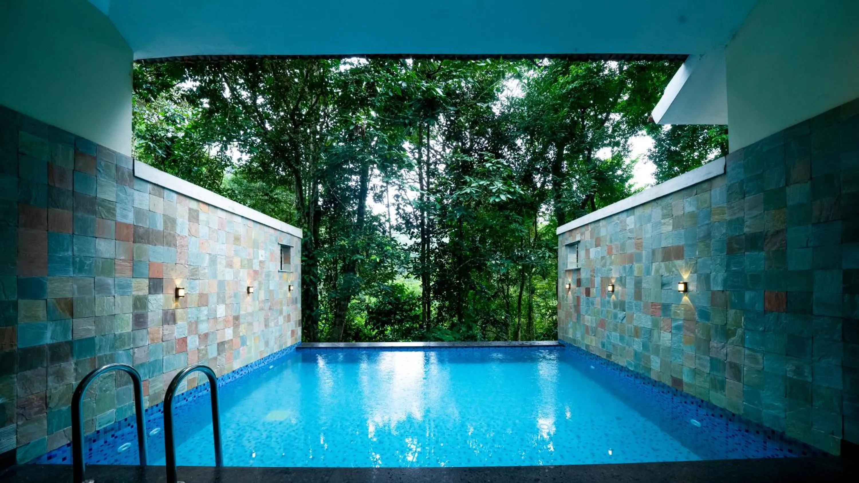 Swimming pool in Vythiri Holiday Resort, Wayanad