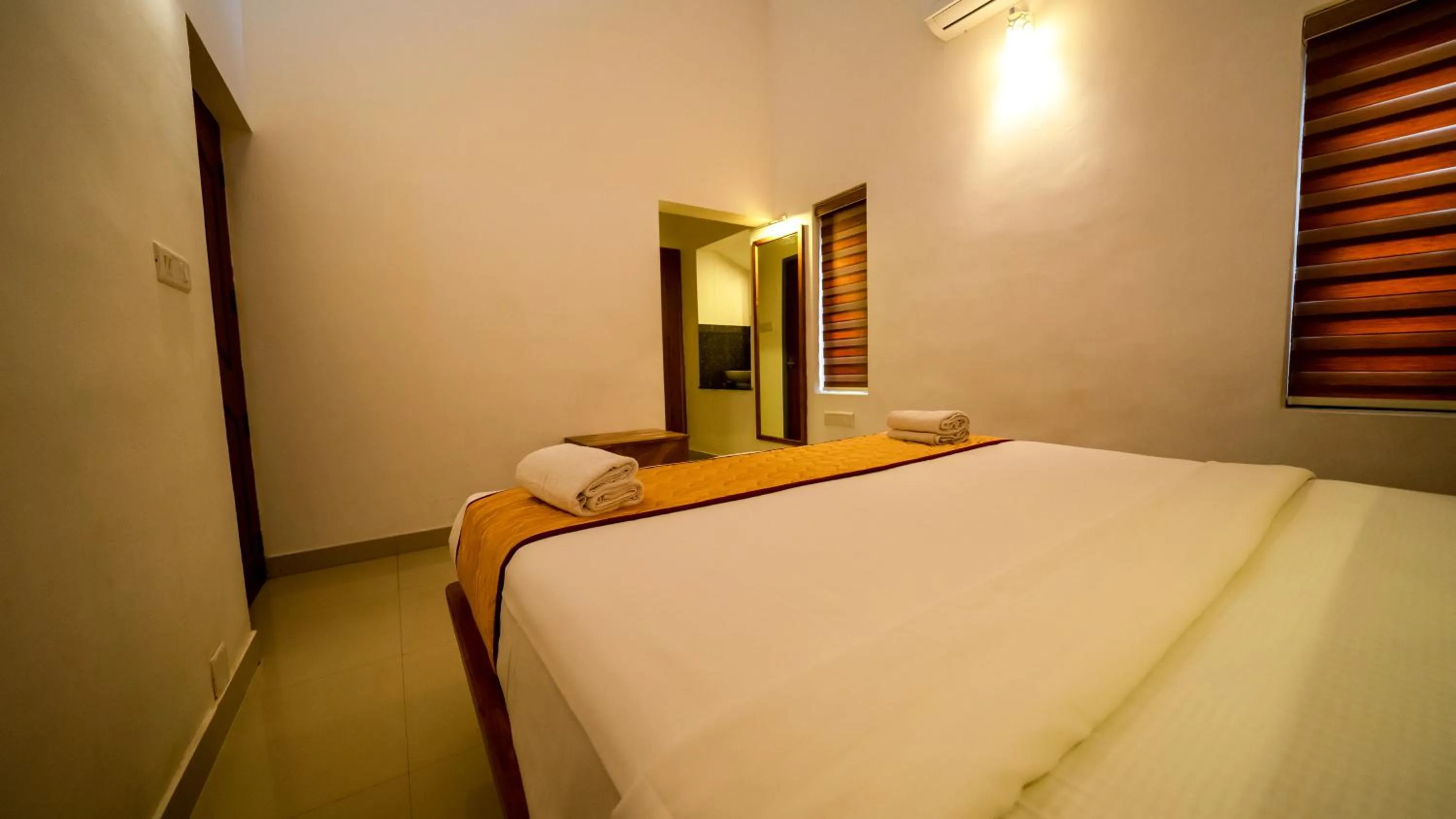 Photo of the whole room, Bed in Vythiri Holiday Resort, Wayanad