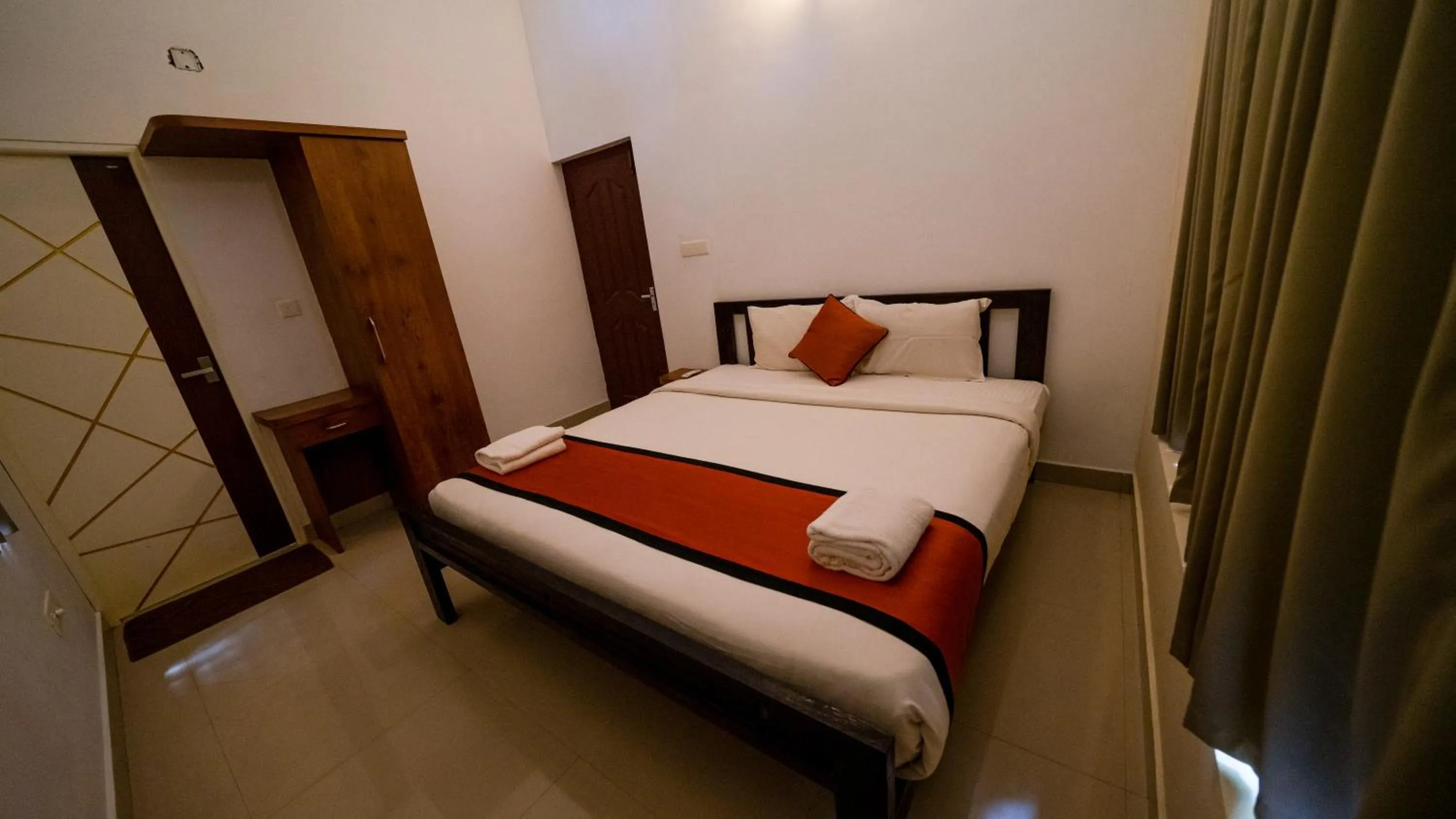 Bed in Vythiri Holiday Resort, Wayanad