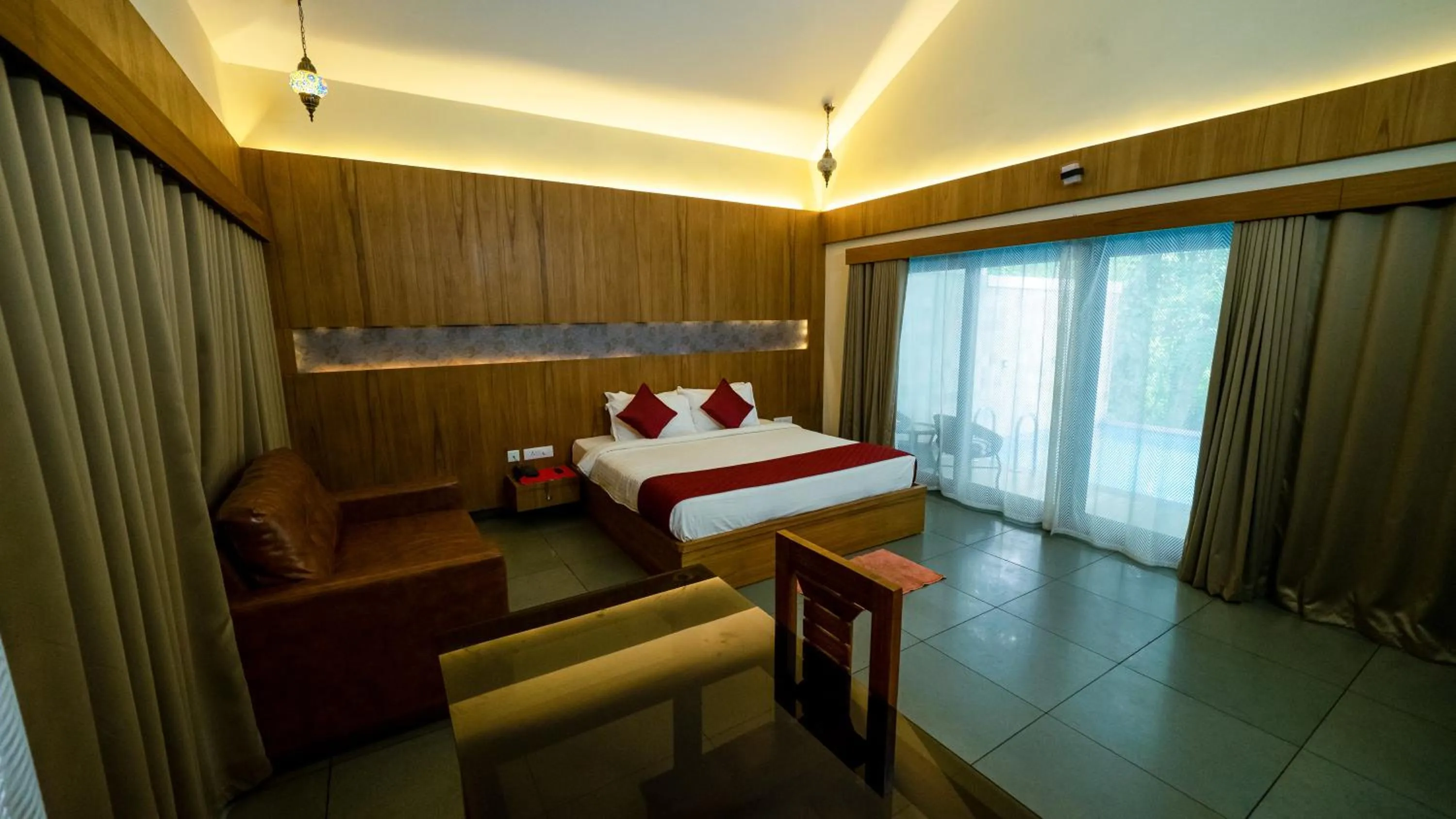 Bed in Vythiri Holiday Resort, Wayanad