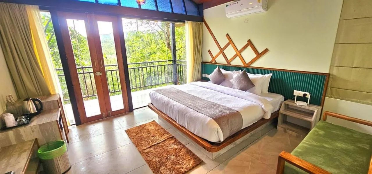 Bed in Vythiri Holiday Resort, Wayanad